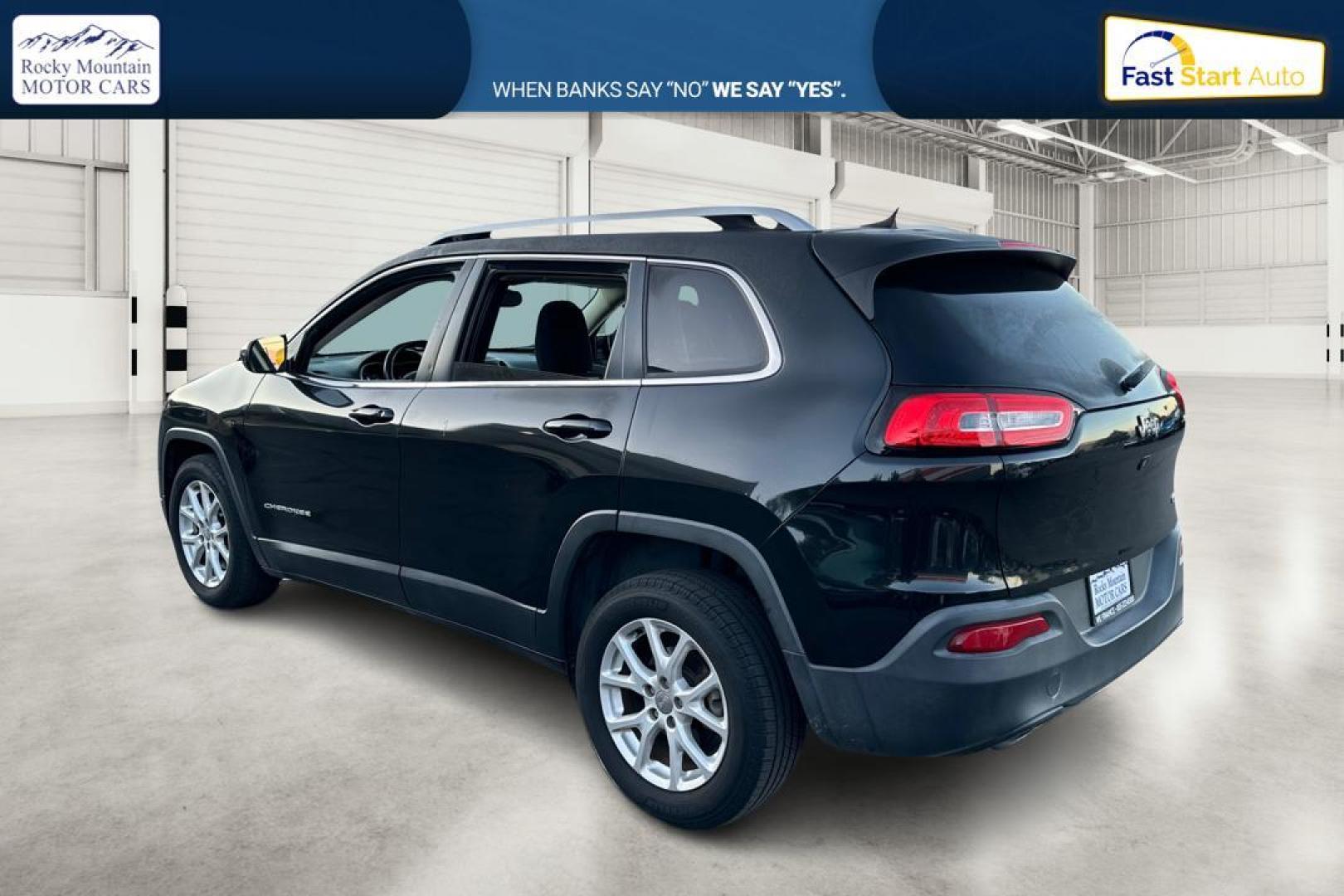 2015 Black Jeep Cherokee Latitude FWD (1C4PJLCB7FW) with an 2.4L L4 DOHC 16V engine, 9-Speed Automatic transmission, located at 344 S Washington Blvd, Ogden, UT, 84404, (801) 399-1799, 41.255482, -111.970848 - Photo#5