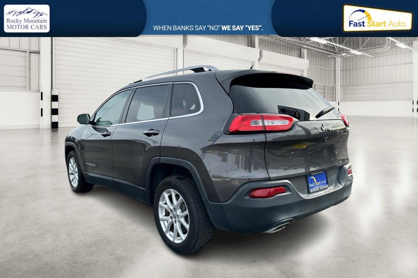 2015 Gray Jeep Cherokee Latitude FWD (1C4PJLCS0FW) with an 3.2L V6 DOHC 24V engine, 9-Speed Automatic transmission, located at 7755 State Street, Midvale, UT, 84047, (801) 753-9063, 40.610329, -111.892159 - Photo#5