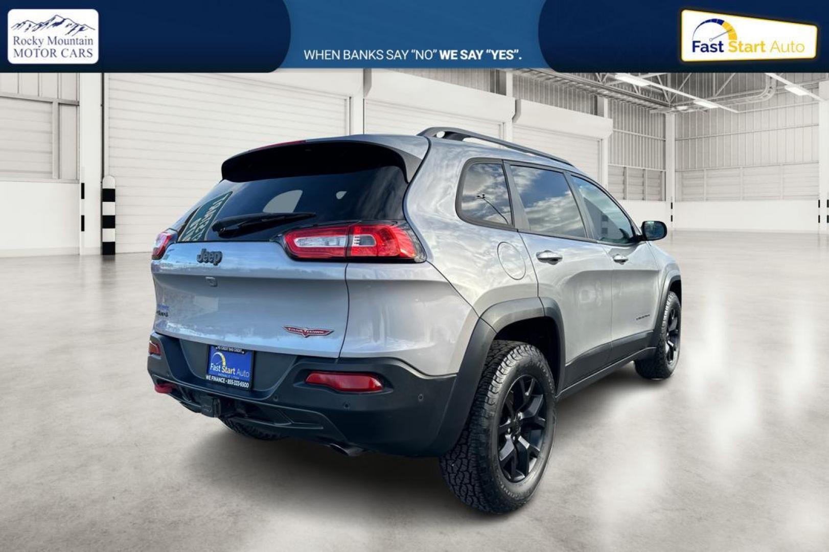 2015 Silver Jeep Cherokee Trailhawk 4WD (1C4PJMBS9FW) with an 3.2L V6 DOHC 24V engine, 9-Speed Automatic transmission, located at 7755 State Street, Midvale, UT, 84047, (801) 753-9063, 40.610329, -111.892159 - Photo#2