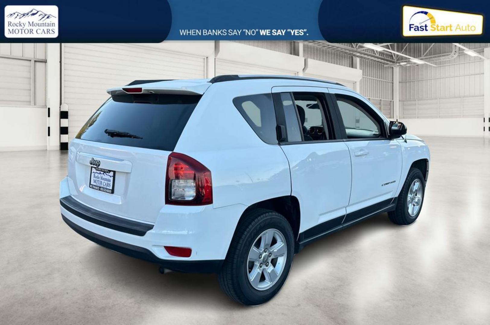 2015 White Jeep Compass Sport FWD (1C4NJCBA4FD) with an 2.0L L4 DOHC 16V engine, Automatic, CVT transmission, located at 344 S Washington Blvd, Ogden, UT, 84404, (801) 399-1799, 41.255482, -111.970848 - Photo#2