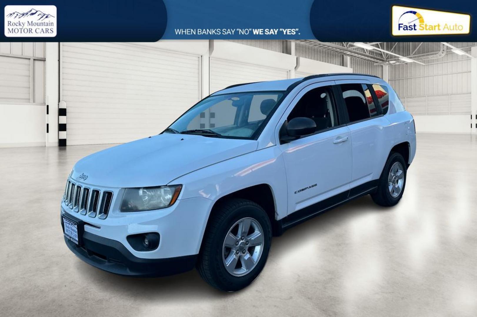 2015 White Jeep Compass Sport FWD (1C4NJCBA4FD) with an 2.0L L4 DOHC 16V engine, Automatic, CVT transmission, located at 344 S Washington Blvd, Ogden, UT, 84404, (801) 399-1799, 41.255482, -111.970848 - Photo#8