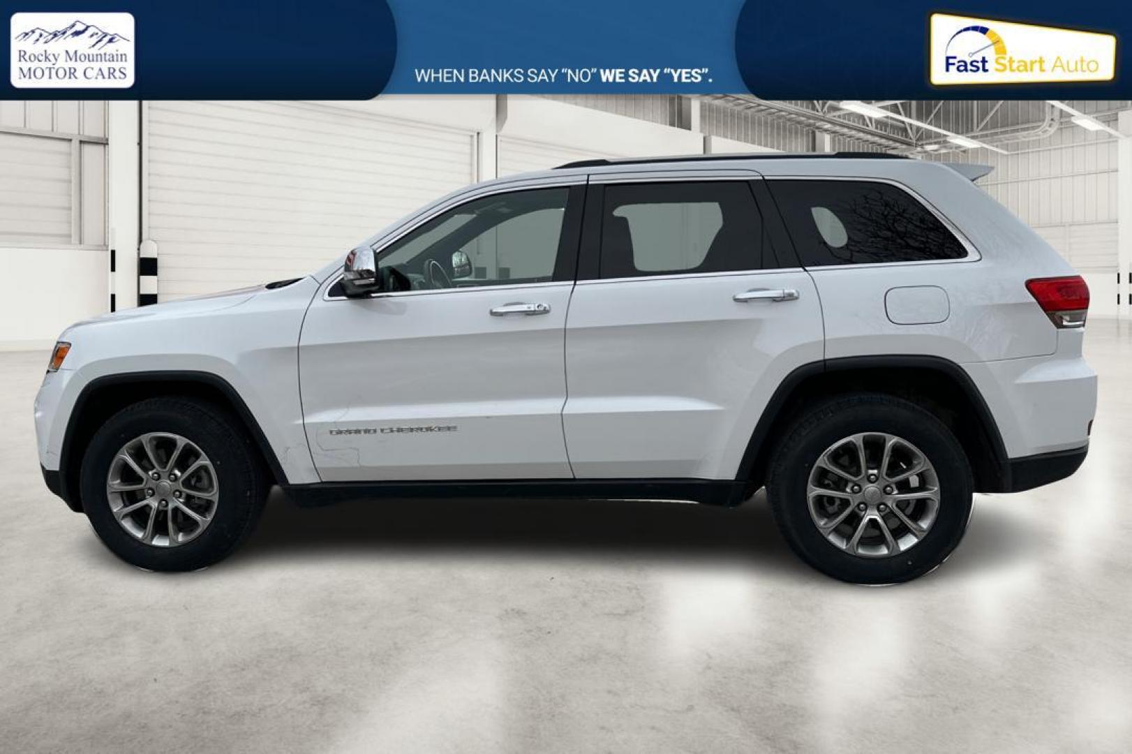 2015 White Jeep Grand Cherokee Limited 2WD (1C4RJEBG2FC) with an 3.6L V6 DOHC 24V engine, 8-Speed Automatic transmission, located at 767 S State Road, Pleasant Grove, UT, 84062, (801) 785-1058, 40.354839, -111.736687 - Photo#6