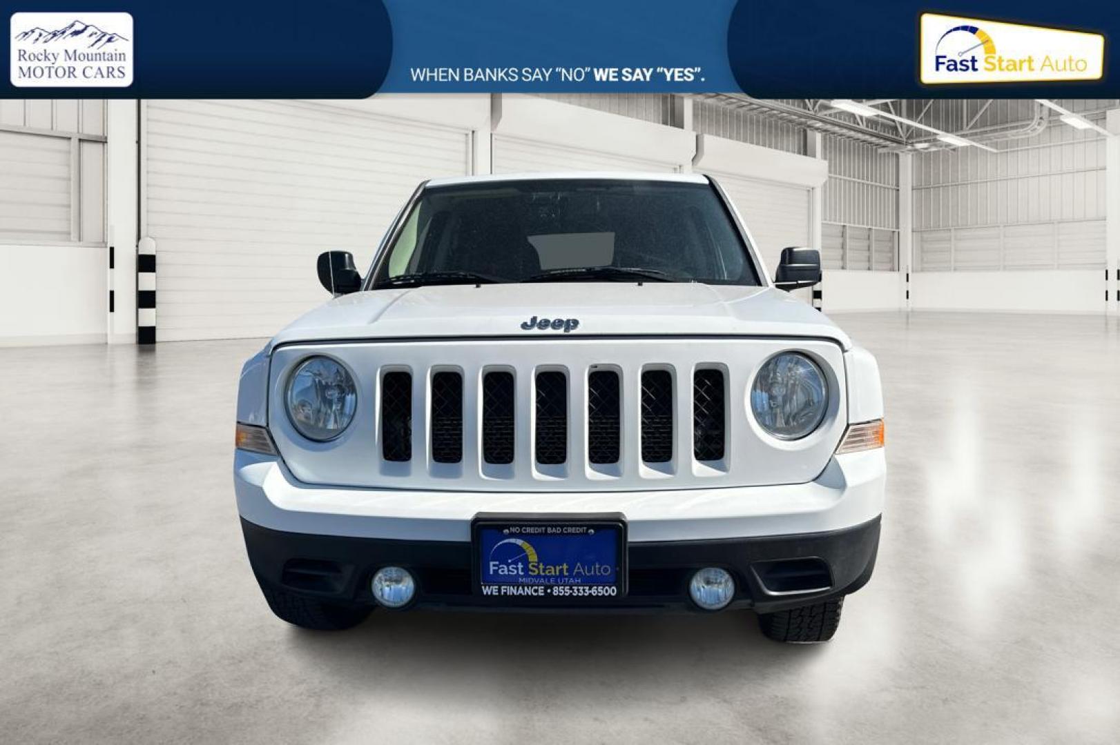 2015 White Jeep Patriot Sport 4WD (1C4NJRBB1FD) with an 2.4L L4 DOHC 16V engine, Automatic, CVT transmission, located at 344 S Washington Blvd, Ogden, UT, 84404, (801) 399-1799, 41.255482, -111.970848 - Photo#9