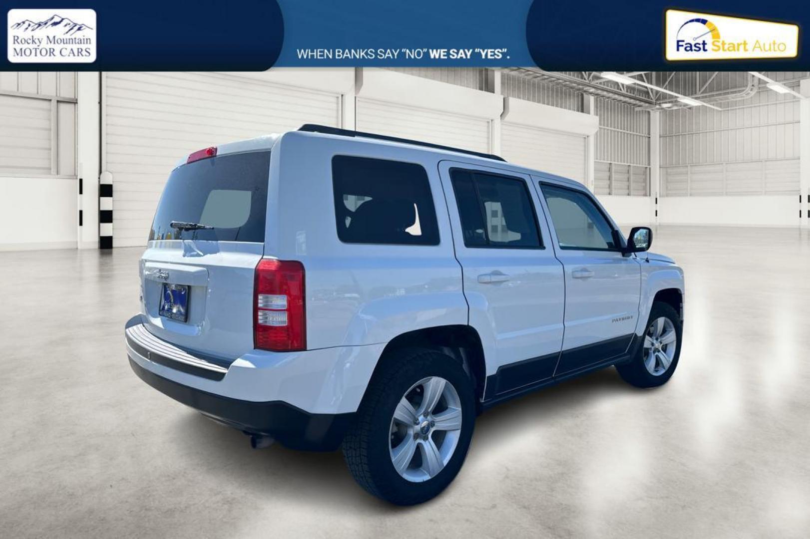 2015 White Jeep Patriot Sport 4WD (1C4NJRBB1FD) with an 2.4L L4 DOHC 16V engine, Automatic, CVT transmission, located at 344 S Washington Blvd, Ogden, UT, 84404, (801) 399-1799, 41.255482, -111.970848 - Photo#2