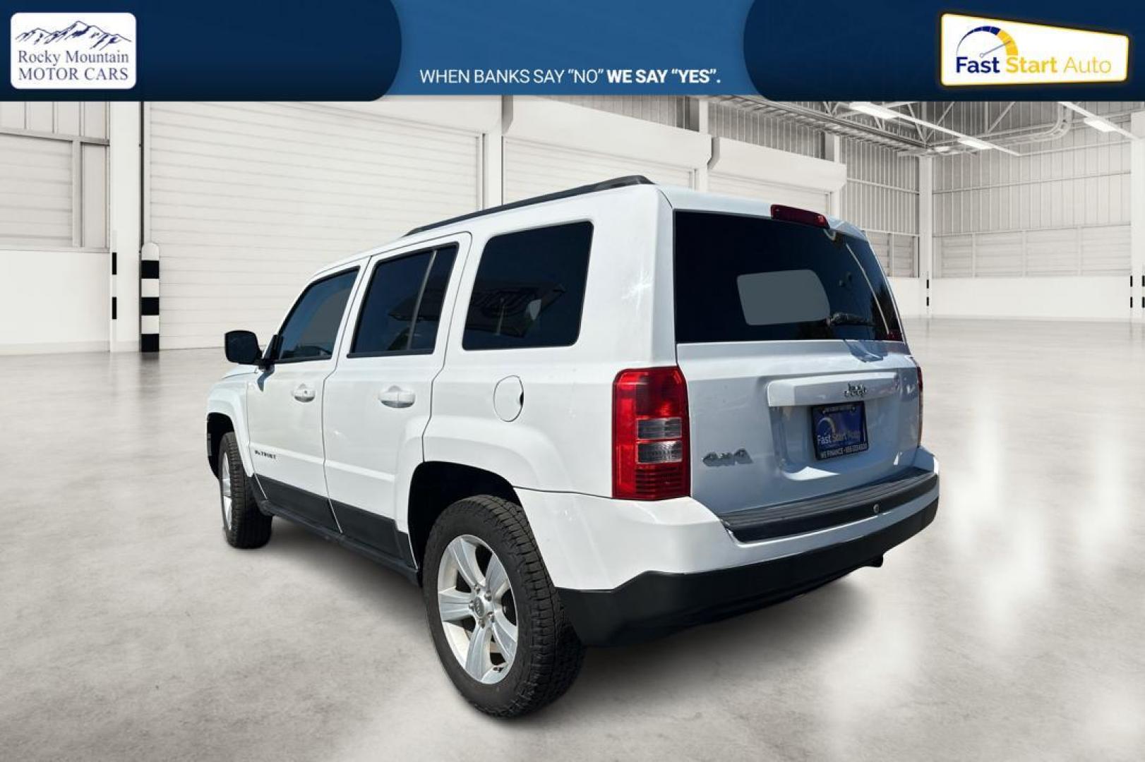 2015 White Jeep Patriot Sport 4WD (1C4NJRBB1FD) with an 2.4L L4 DOHC 16V engine, Automatic, CVT transmission, located at 344 S Washington Blvd, Ogden, UT, 84404, (801) 399-1799, 41.255482, -111.970848 - Photo#5