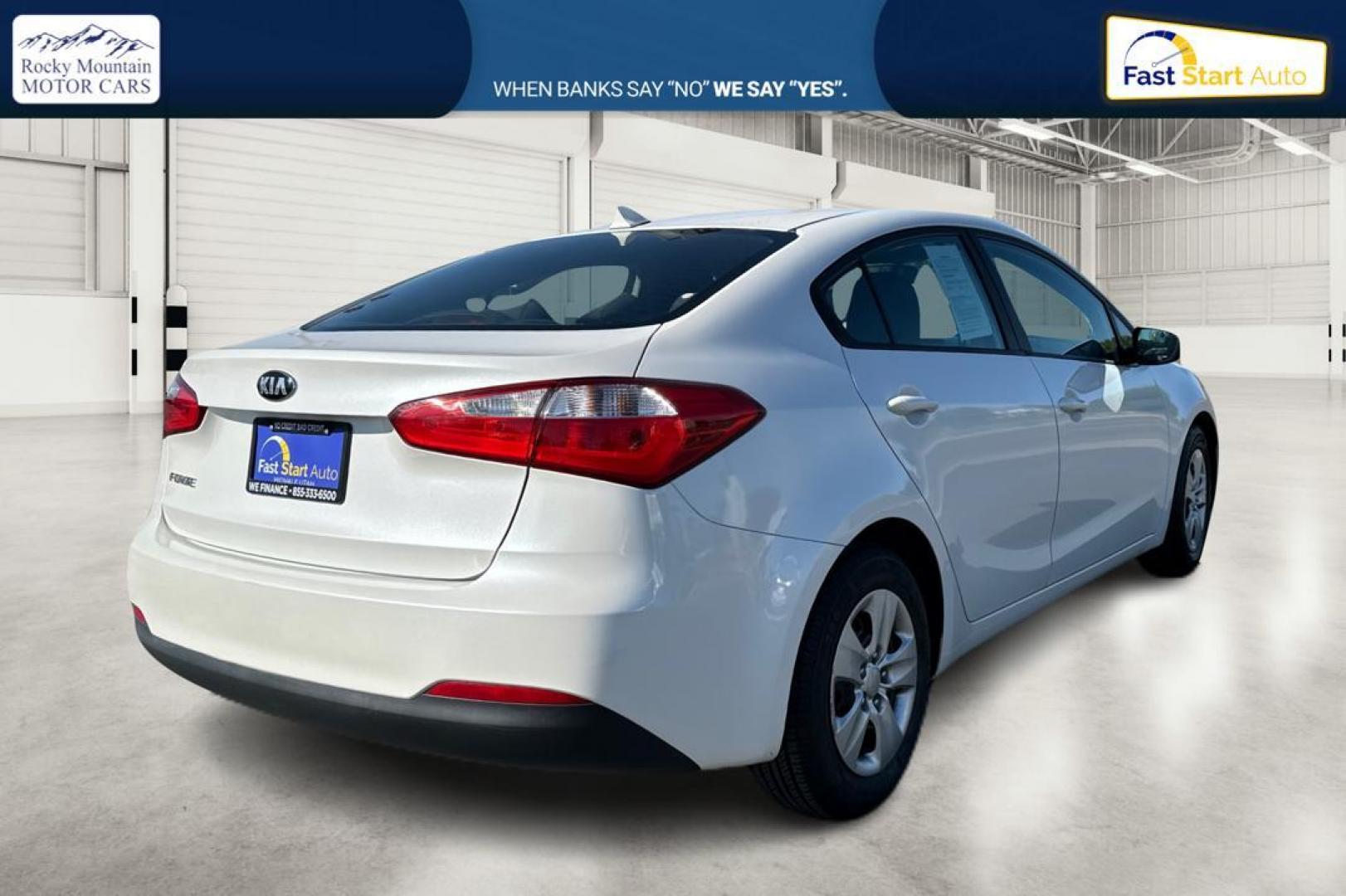 2015 White Kia Forte EX (KNAFX4A61F5) with an 1.8L L4 DOHC 16V engine, 6-Speed Automatic transmission, located at 767 S State Road, Pleasant Grove, UT, 84062, (801) 785-1058, 40.354839, -111.736687 - Photo#2