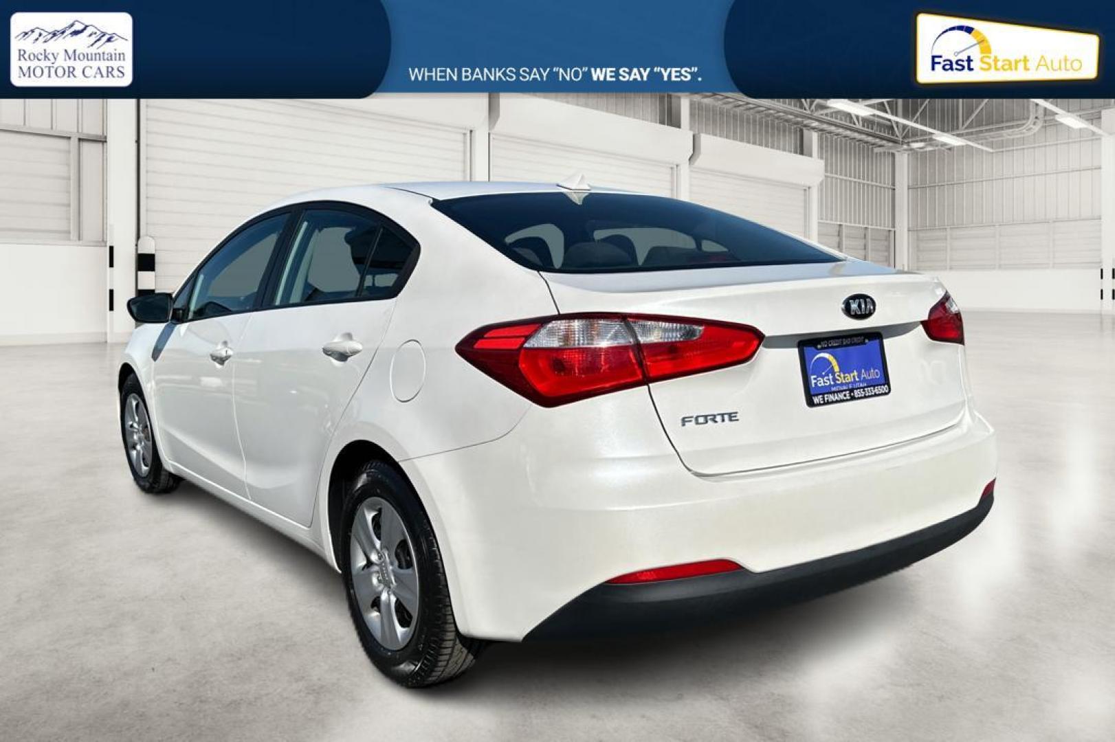 2015 White Kia Forte EX (KNAFX4A61F5) with an 1.8L L4 DOHC 16V engine, 6-Speed Automatic transmission, located at 767 S State Road, Pleasant Grove, UT, 84062, (801) 785-1058, 40.354839, -111.736687 - Photo#5