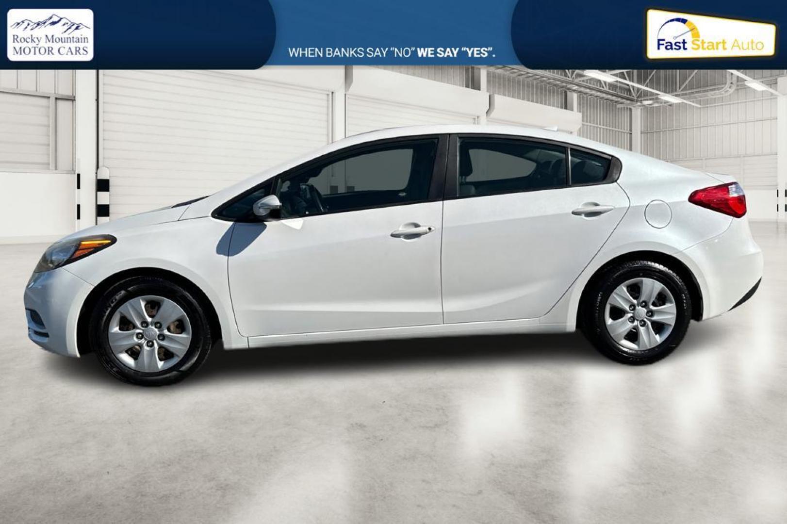 2015 White Kia Forte EX (KNAFX4A61F5) with an 1.8L L4 DOHC 16V engine, 6-Speed Automatic transmission, located at 767 S State Road, Pleasant Grove, UT, 84062, (801) 785-1058, 40.354839, -111.736687 - Photo#6