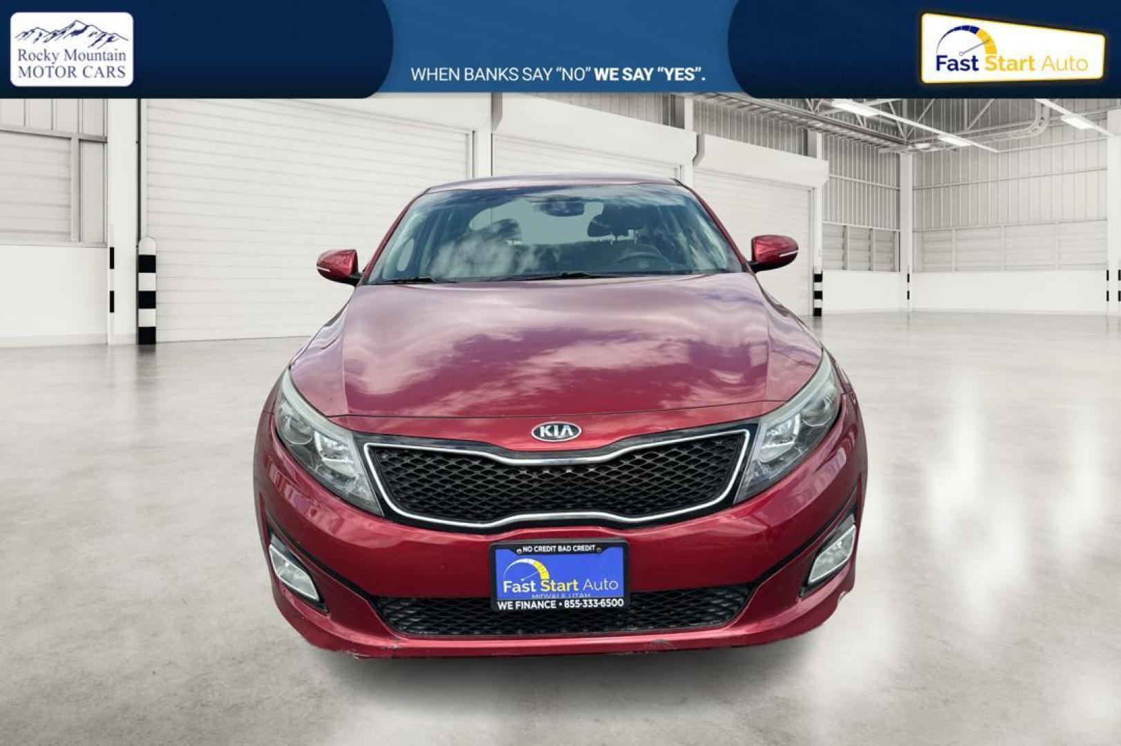 2015 Red Kia Optima LX (5XXGM4A73FG) with an 2.4L L4 DOHC 16V engine, 6-Speed Automatic transmission, located at 7755 State Street, Midvale, UT, 84047, (801) 753-9063, 40.610329, -111.892159 - Photo#7