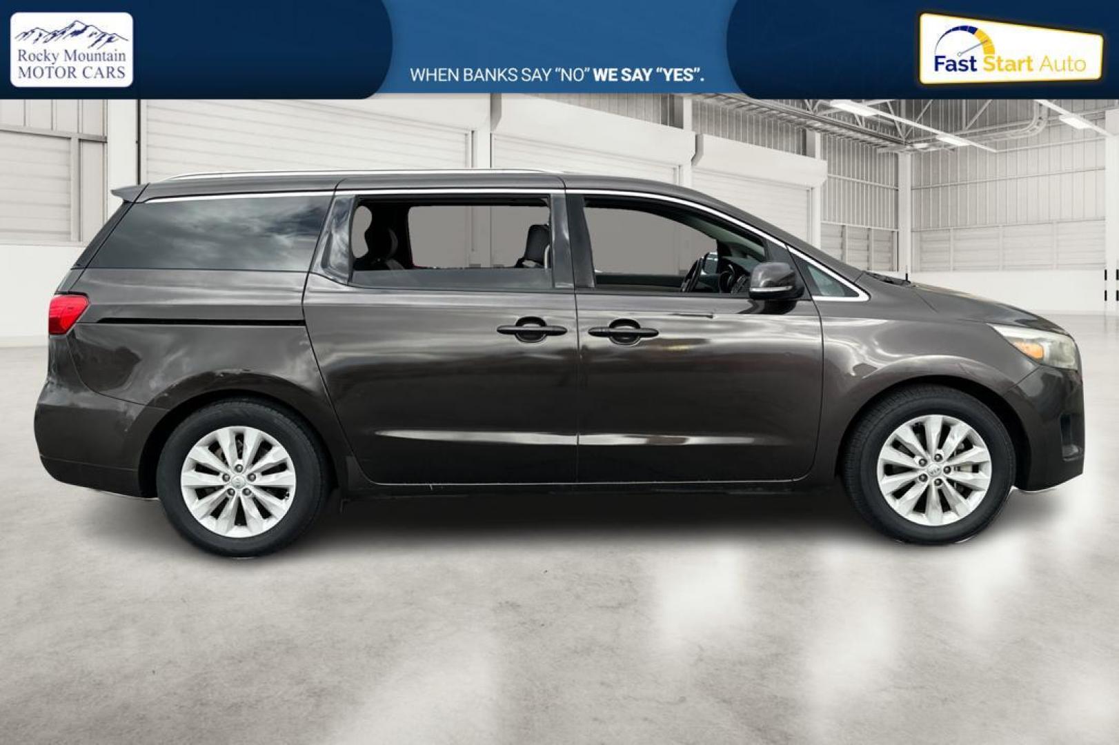 2015 Brown Kia Sedona EX (KNDMC5C12F6) with an 3.3L V6 DOHC 24V engine, 6-Speed Automatic transmission, located at 767 S State Road, Pleasant Grove, UT, 84062, (801) 785-1058, 40.354839, -111.736687 - Photo#1