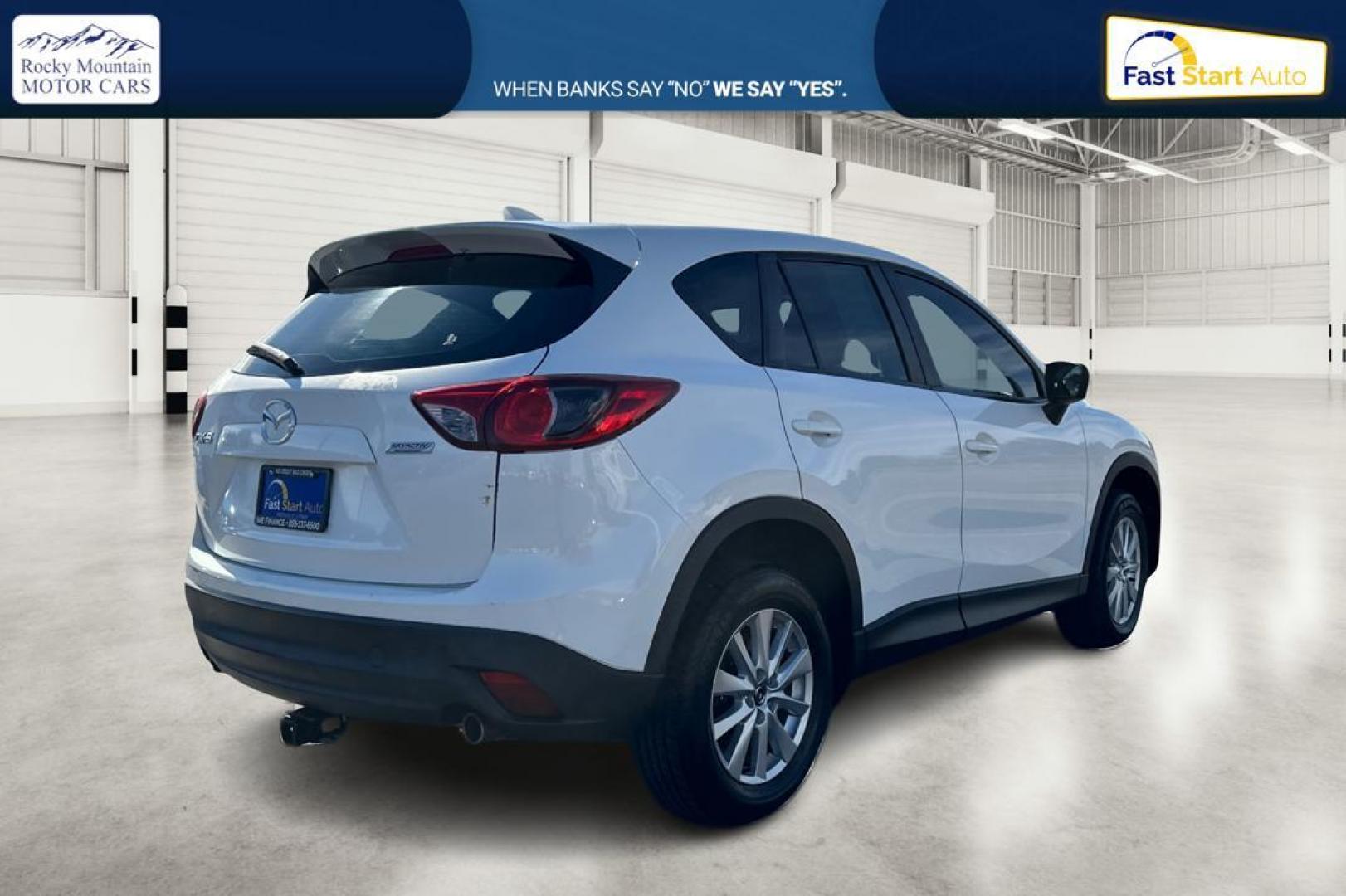 2015 White Mazda CX-5 Sport AT (JM3KE2BE4F0) with an 2.5L L4 DOHC 16V engine, 6-Speed Automatic transmission, located at 7755 State Street, Midvale, UT, 84047, (801) 753-9063, 40.610329, -111.892159 - Photo#2