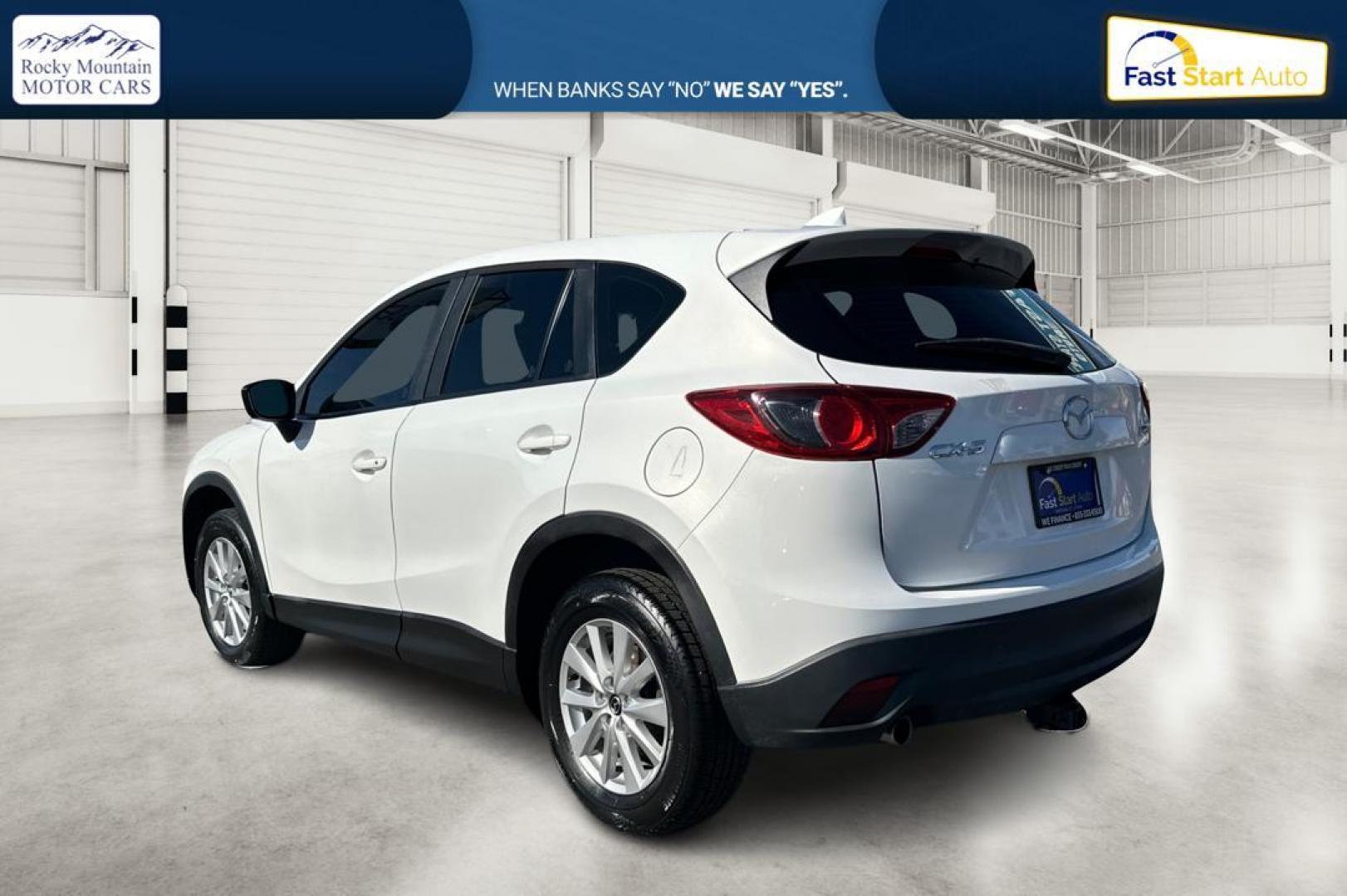 2015 White Mazda CX-5 Sport AT (JM3KE2BE4F0) with an 2.5L L4 DOHC 16V engine, 6-Speed Automatic transmission, located at 7755 State Street, Midvale, UT, 84047, (801) 753-9063, 40.610329, -111.892159 - Photo#5