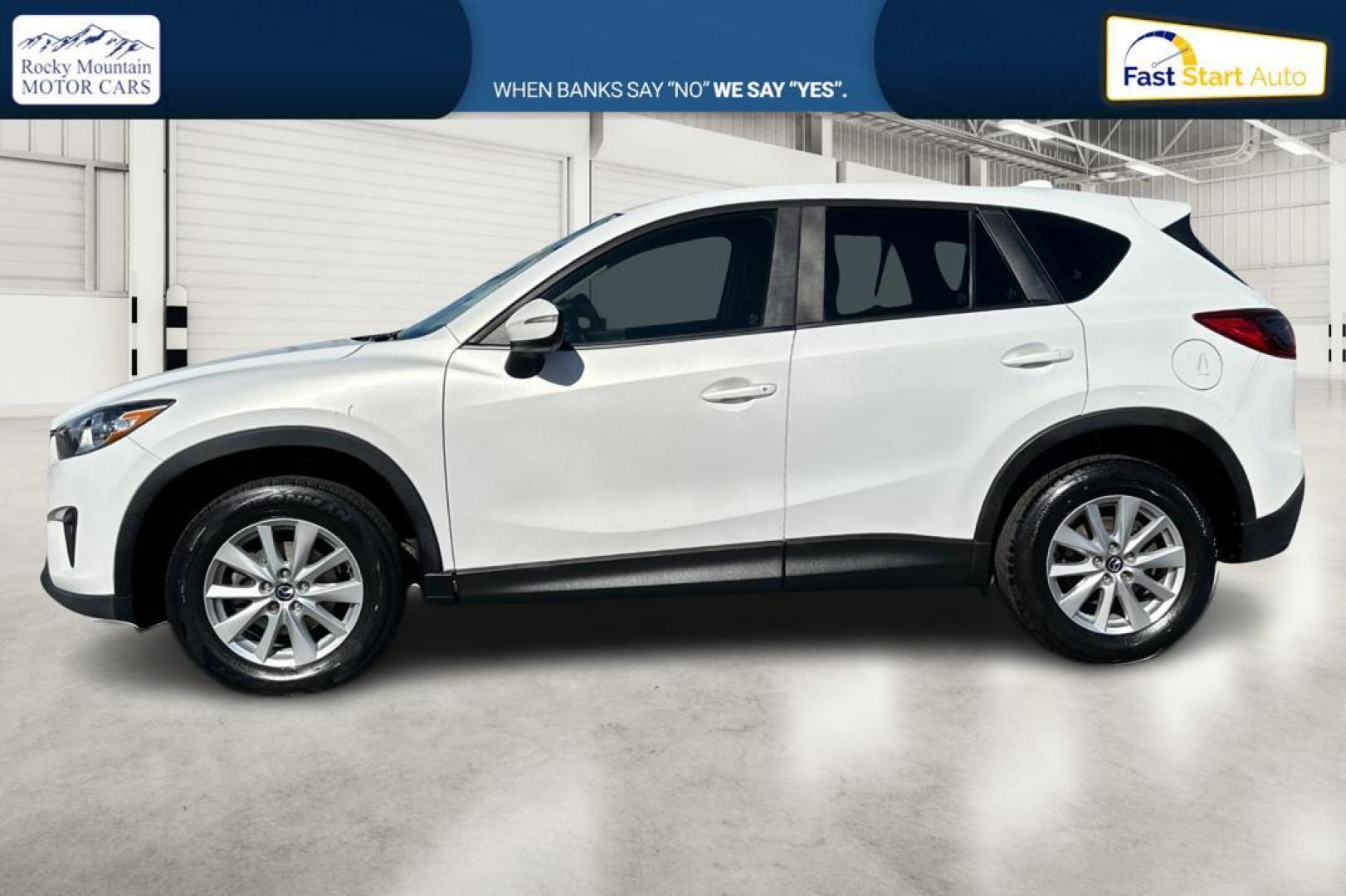 2015 White Mazda CX-5 Sport AT (JM3KE2BE4F0) with an 2.5L L4 DOHC 16V engine, 6-Speed Automatic transmission, located at 7755 State Street, Midvale, UT, 84047, (801) 753-9063, 40.610329, -111.892159 - Photo#6