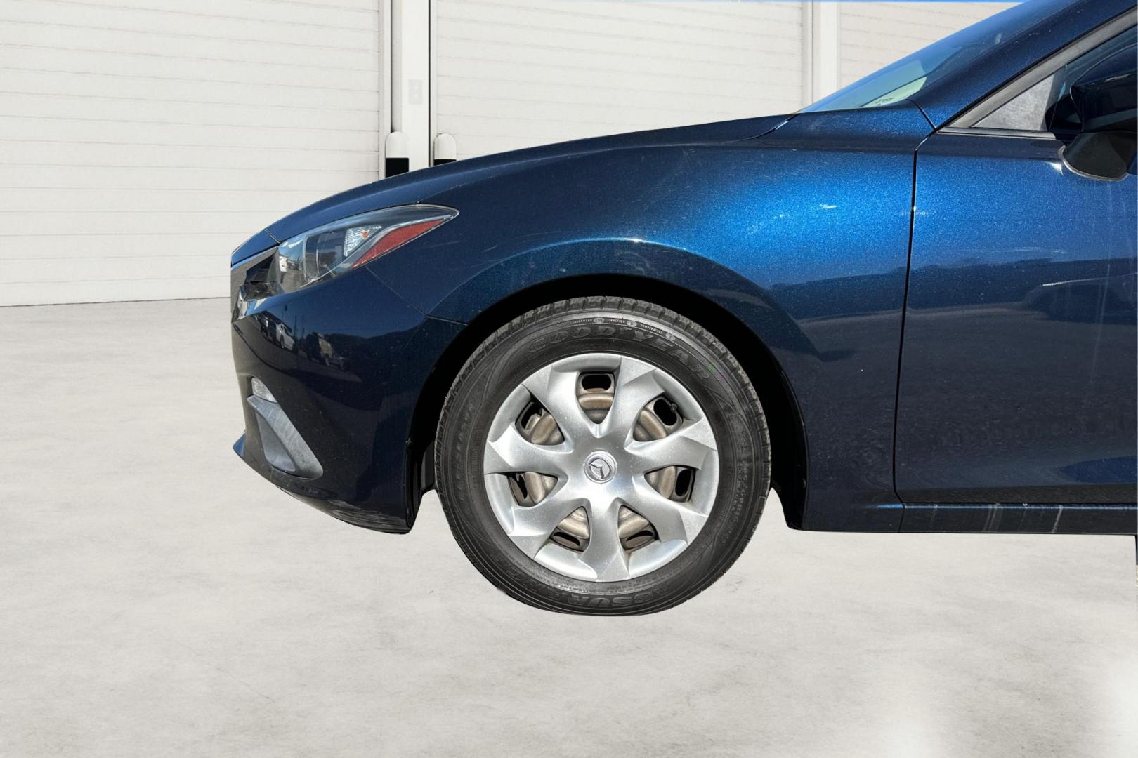 2015 Blue Mazda MAZDA3 i Sport AT 4-Door (3MZBM1U78FM) with an 2.0L L4 DOHC 16V engine, 6-Speed Automatic transmission, located at 344 S Washington Blvd, Ogden, UT, 84404, (801) 399-1799, 41.255482, -111.970848 - Photo#12