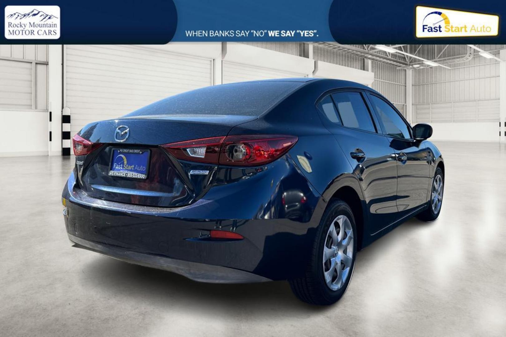 2015 Blue Mazda MAZDA3 i Sport AT 4-Door (3MZBM1U78FM) with an 2.0L L4 DOHC 16V engine, 6-Speed Automatic transmission, located at 344 S Washington Blvd, Ogden, UT, 84404, (801) 399-1799, 41.255482, -111.970848 - Photo#2