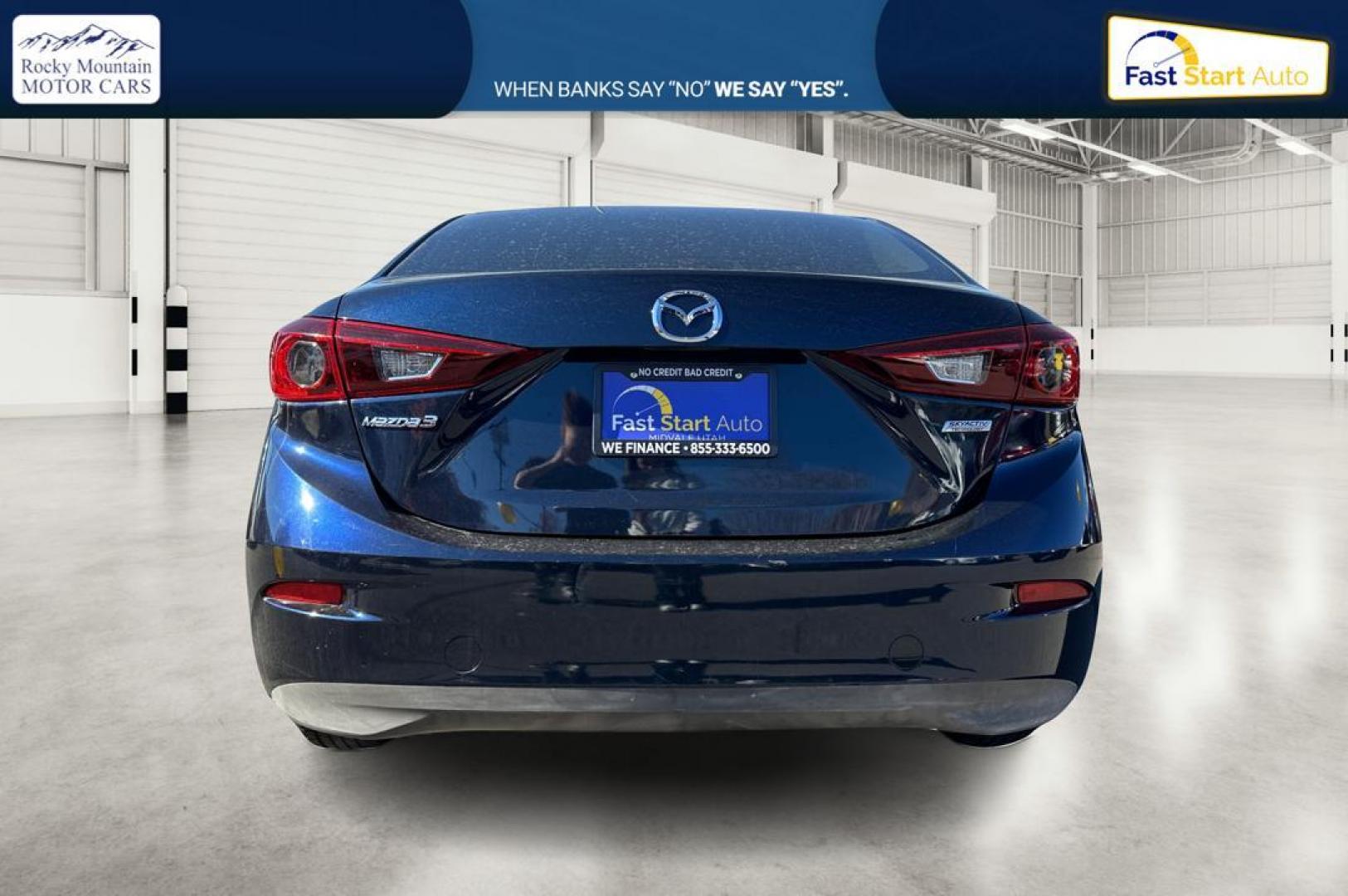 2015 Blue Mazda MAZDA3 i Sport AT 4-Door (3MZBM1U78FM) with an 2.0L L4 DOHC 16V engine, 6-Speed Automatic transmission, located at 344 S Washington Blvd, Ogden, UT, 84404, (801) 399-1799, 41.255482, -111.970848 - Photo#4