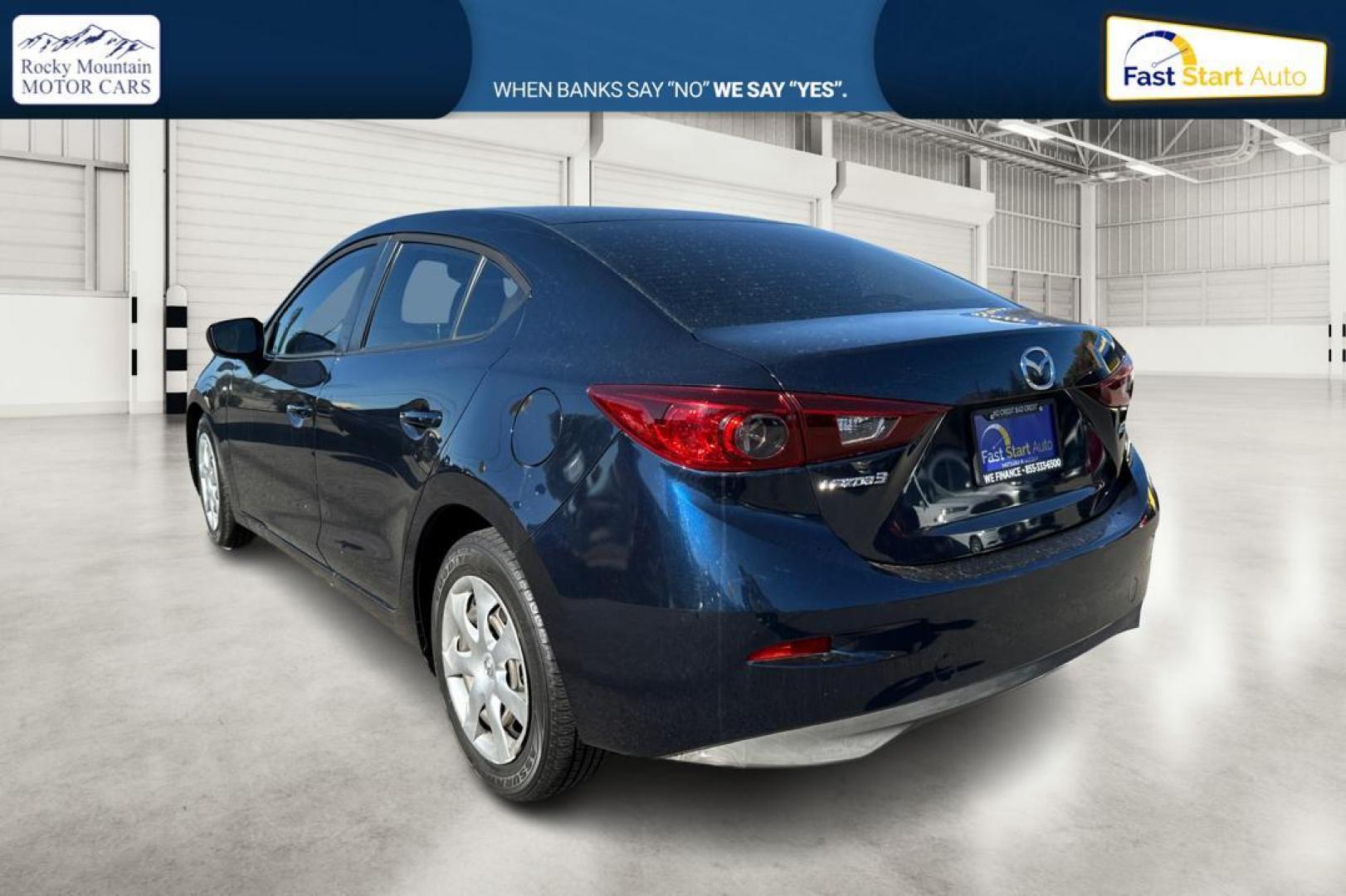 2015 Blue Mazda MAZDA3 i Sport AT 4-Door (3MZBM1U78FM) with an 2.0L L4 DOHC 16V engine, 6-Speed Automatic transmission, located at 344 S Washington Blvd, Ogden, UT, 84404, (801) 399-1799, 41.255482, -111.970848 - Photo#5