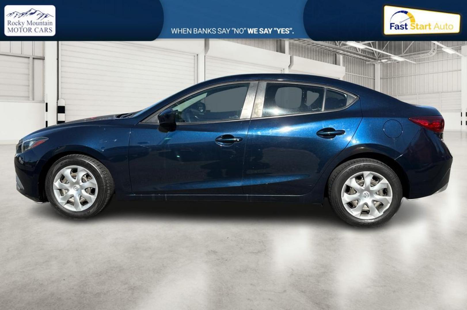 2015 Blue Mazda MAZDA3 i Sport AT 4-Door (3MZBM1U78FM) with an 2.0L L4 DOHC 16V engine, 6-Speed Automatic transmission, located at 344 S Washington Blvd, Ogden, UT, 84404, (801) 399-1799, 41.255482, -111.970848 - Photo#6