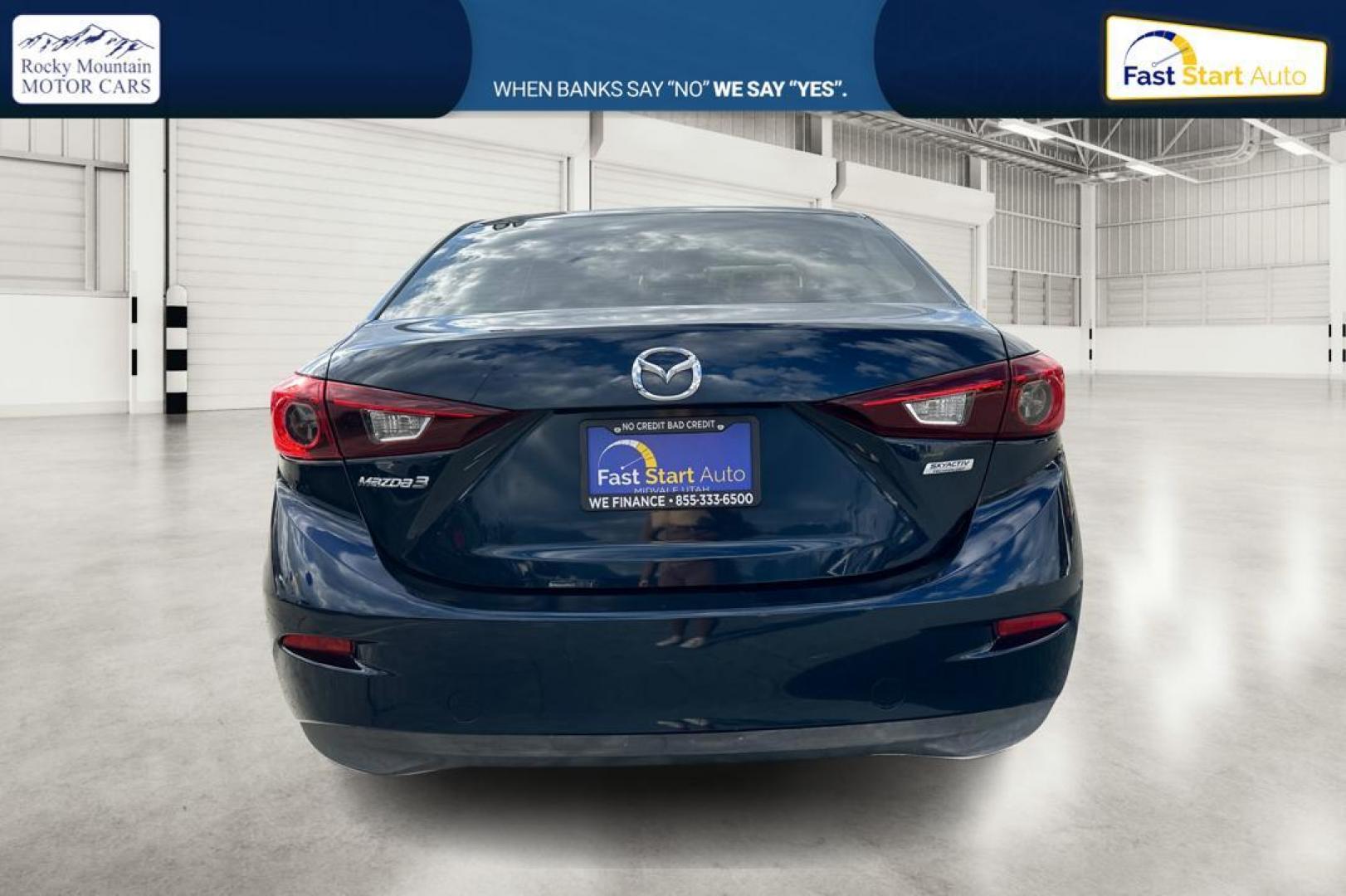 2015 Blue Mazda MAZDA3 i Sport AT 4-Door (3MZBM1U78FM) with an 2.0L L4 DOHC 16V engine, 6-Speed Automatic transmission, located at 7755 State Street, Midvale, UT, 84047, (801) 753-9063, 40.610329, -111.892159 - Photo#4