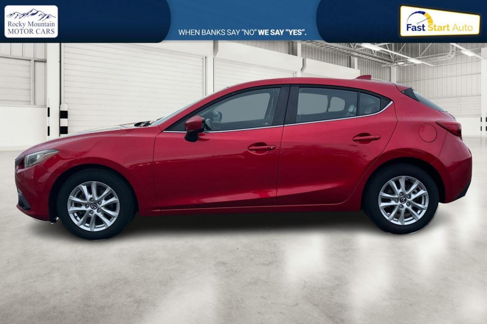 2015 Red Mazda MAZDA3 i Grand Touring AT 5-Door (JM1BM1M75F1) with an 2.0L L4 DOHC 16V engine, 6-Speed Automatic transmission, located at 7755 State Street, Midvale, UT, 84047, (801) 753-9063, 40.610329, -111.892159 - Photo#6