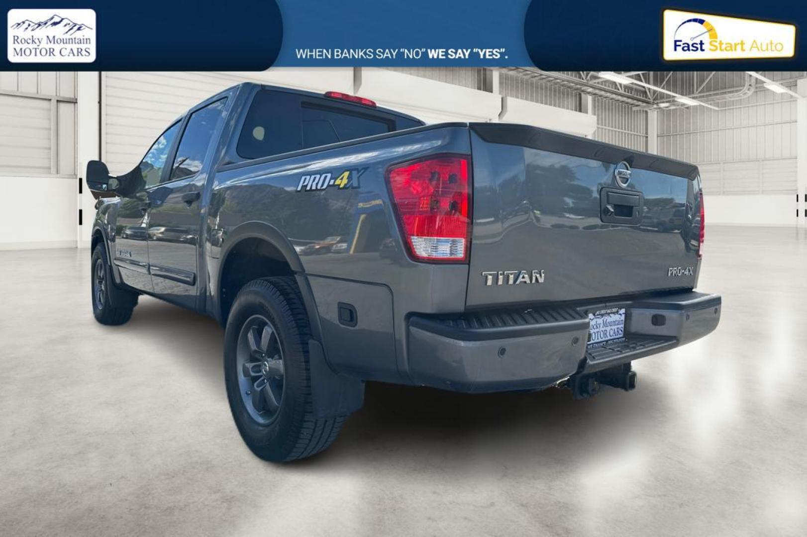 2015 Gray Nissan Titan PRO-4X Crew Cab 4WD SWB (1N6AA0ECXFN) with an 5.6L V8 DOHC 32V engine, 5-Speed Automatic transmission, located at 7755 State Street, Midvale, UT, 84047, (801) 753-9063, 40.610329, -111.892159 - Photo#4