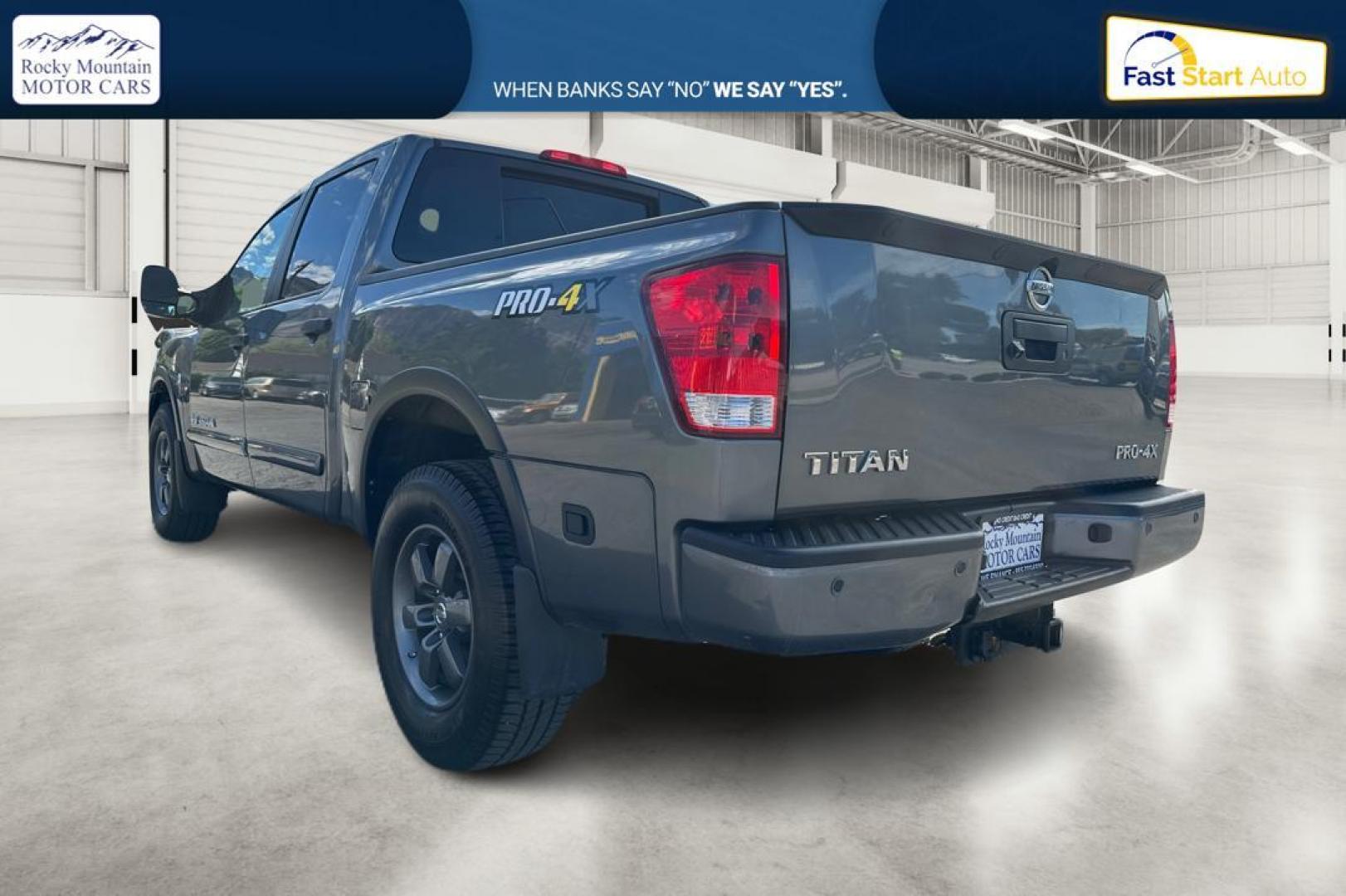 2015 Gray Nissan Titan PRO-4X Crew Cab 4WD SWB (1N6AA0ECXFN) with an 5.6L V8 DOHC 32V engine, 5-Speed Automatic transmission, located at 7755 State Street, Midvale, UT, 84047, (801) 753-9063, 40.610329, -111.892159 - Photo#2