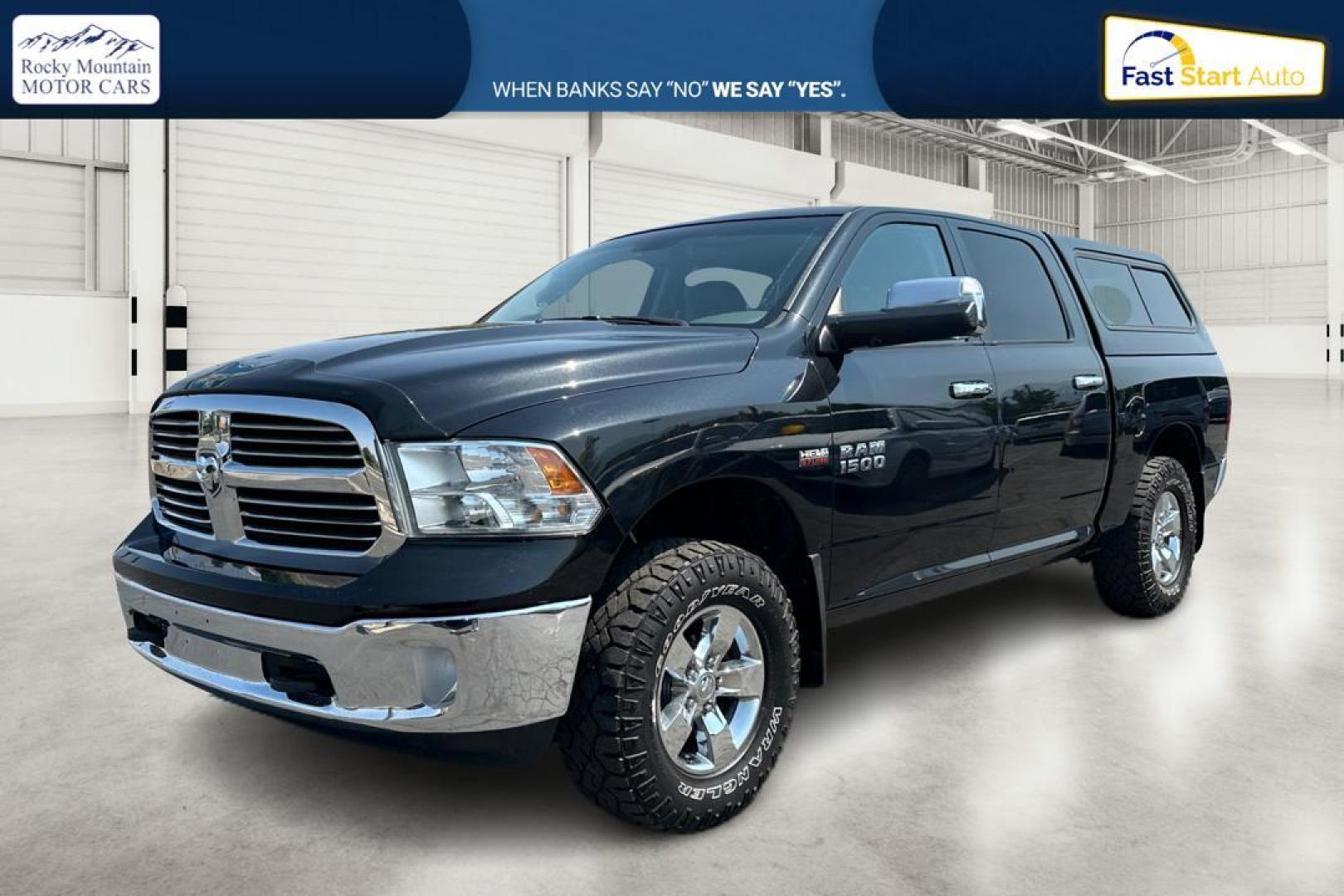 2015 Black RAM 1500 SLT Crew Cab SWB 4WD (1C6RR7LT3FS) with an 5.7L V8 OHV 16V engine, 6-Speed Automatic transmission, located at 7755 State Street, Midvale, UT, 84047, (801) 753-9063, 40.610329, -111.892159 - Photo#6