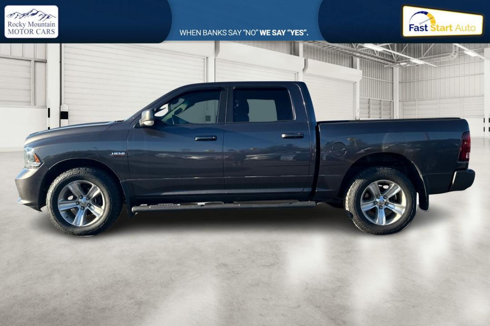 2015 Gray RAM 1500 Sport Crew Cab SWB 4WD (1C6RR7MT1FS) with an 5.7L V8 OHV 16V engine, 6-Speed Automatic transmission, located at 344 S Washington Blvd, Ogden, UT, 84404, (801) 399-1799, 41.255482, -111.970848 - Photo#6