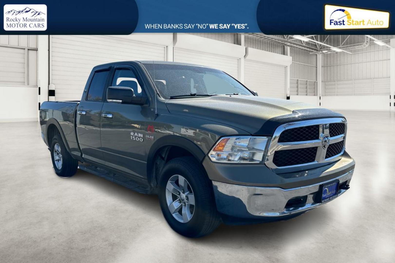 2015 Gold RAM 1500 SLT Quad Cab 4WD (1C6RR7GT8FS) with an 5.7L V8 OHV 16V engine, 6-Speed Automatic transmission, located at 7755 State Street, Midvale, UT, 84047, (801) 753-9063, 40.610329, -111.892159 - Photo#0