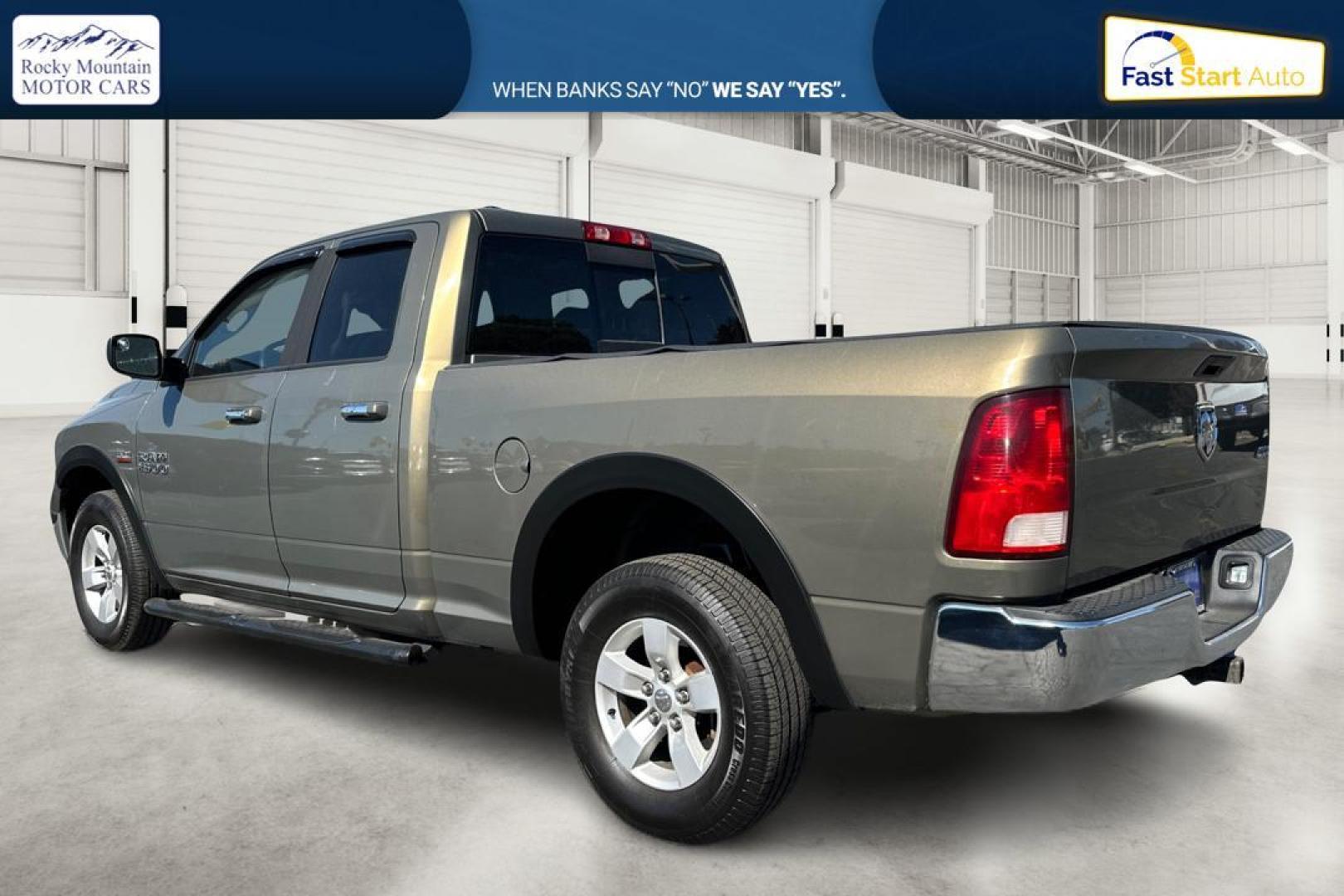 2015 Gold RAM 1500 SLT Quad Cab 4WD (1C6RR7GT8FS) with an 5.7L V8 OHV 16V engine, 6-Speed Automatic transmission, located at 7755 State Street, Midvale, UT, 84047, (801) 753-9063, 40.610329, -111.892159 - Photo#5