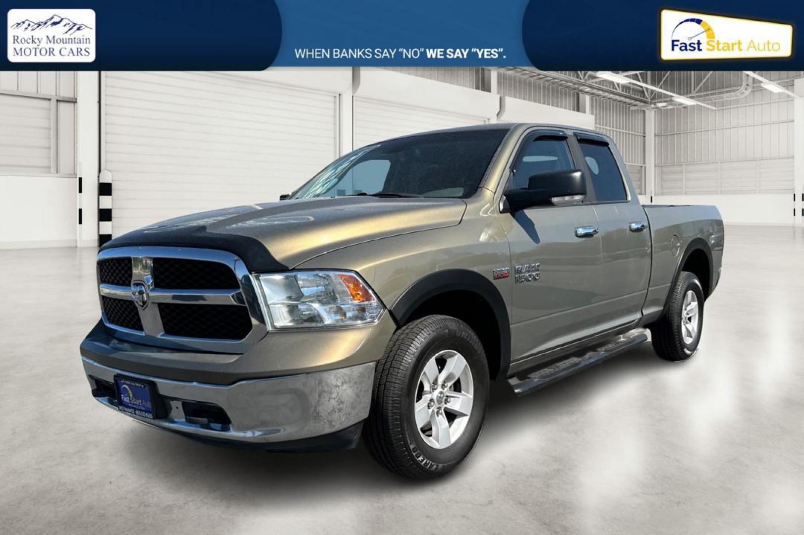 2015 Gold RAM 1500 SLT Quad Cab 4WD (1C6RR7GT8FS) with an 5.7L V8 OHV 16V engine, 6-Speed Automatic transmission, located at 7755 State Street, Midvale, UT, 84047, (801) 753-9063, 40.610329, -111.892159 - Photo#8