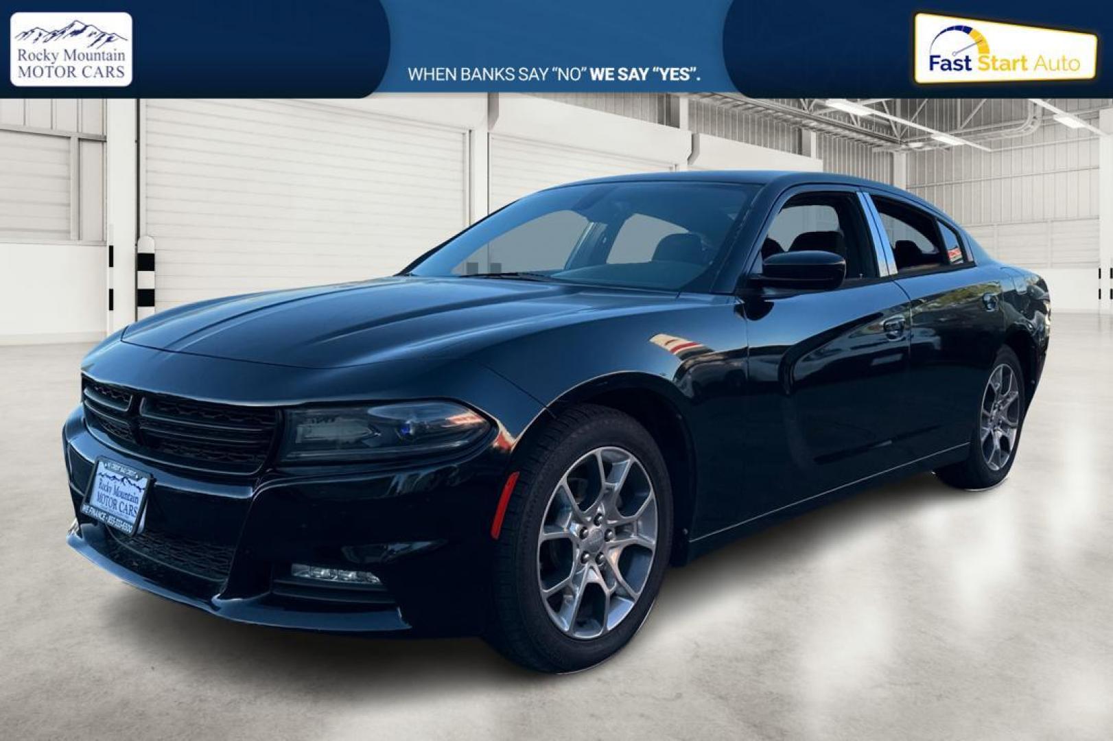 2016 Black Dodge Charger SXT (2C3CDXHG9GH) with an 3.6L V6 DOHC 24V engine, 8A transmission, located at 344 S Washington Blvd, Ogden, UT, 84404, (801) 399-1799, 41.255482, -111.970848 - Photo#8