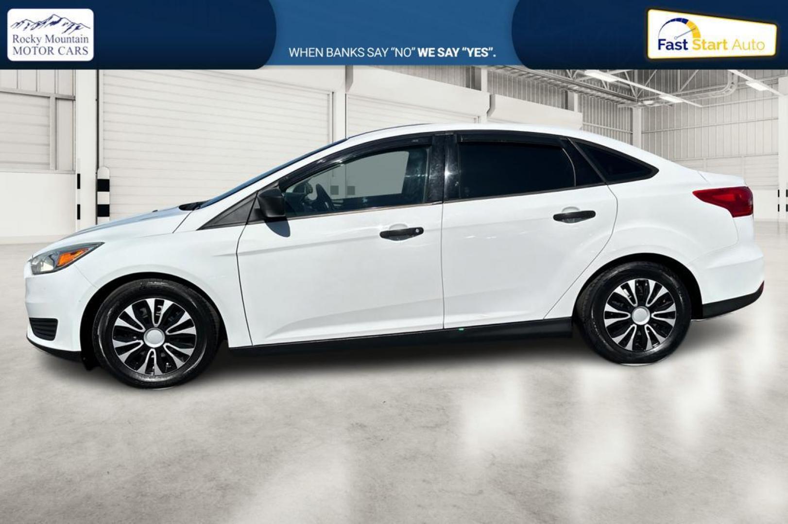 2016 White Ford Focus S Sedan (1FADP3E26GL) with an 2.0L L4 DOHC 16V engine, 5M transmission, located at 7755 State Street, Midvale, UT, 84047, (801) 753-9063, 40.610329, -111.892159 - Photo#5