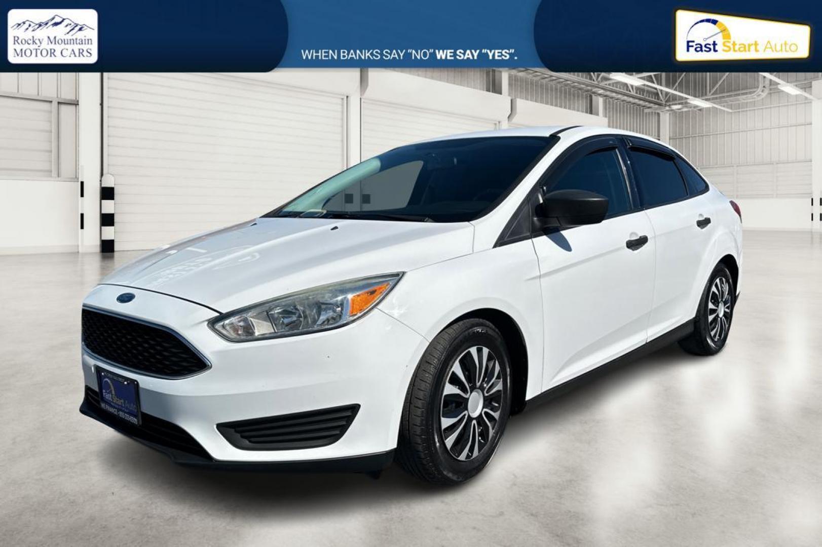 2016 White Ford Focus S Sedan (1FADP3E26GL) with an 2.0L L4 DOHC 16V engine, 5M transmission, located at 7755 State Street, Midvale, UT, 84047, (801) 753-9063, 40.610329, -111.892159 - Photo#6