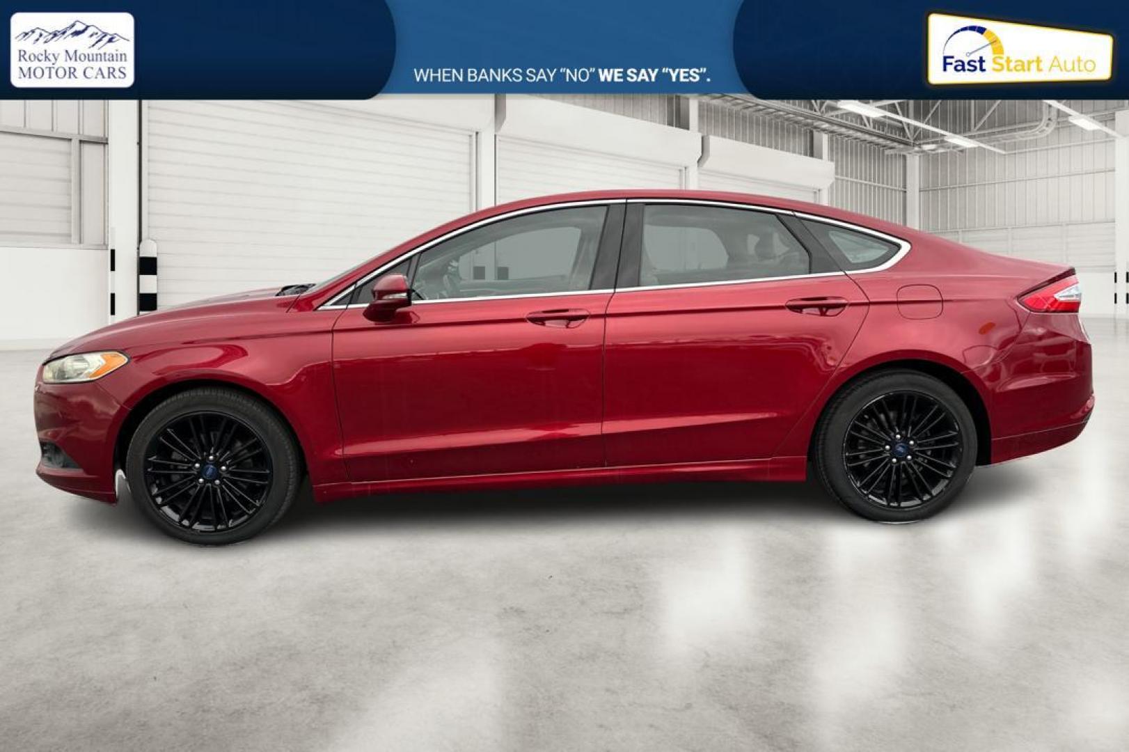 2016 Red Ford Fusion SE (1FA6P0HD4G5) with an 1.5L L4 DOHC 16V engine, 6-Speed Automatic transmission, located at 344 S Washington Blvd, Ogden, UT, 84404, (801) 399-1799, 41.255482, -111.970848 - Photo#6