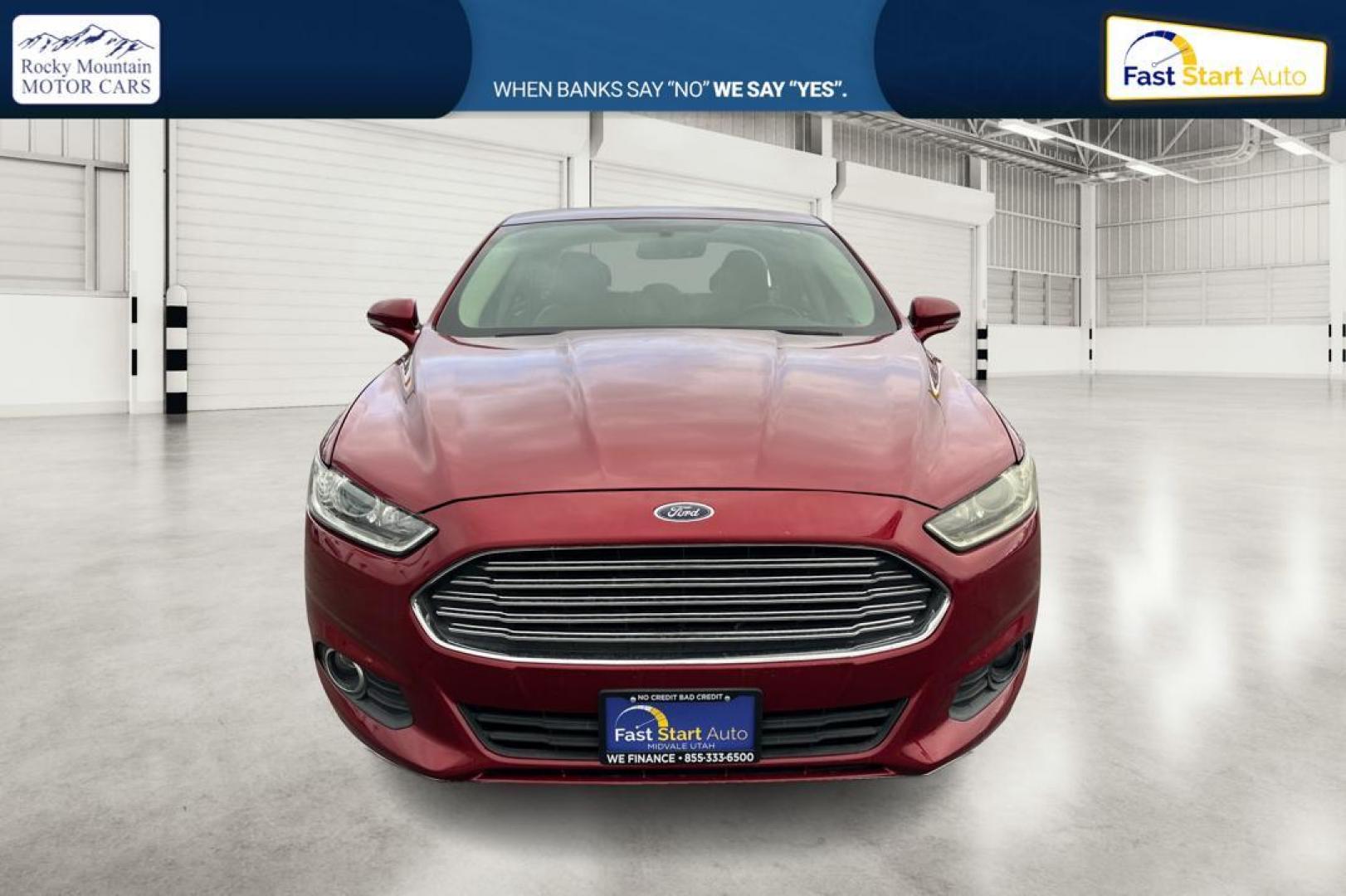 2016 Red Ford Fusion SE (1FA6P0HD4G5) with an 1.5L L4 DOHC 16V engine, 6-Speed Automatic transmission, located at 344 S Washington Blvd, Ogden, UT, 84404, (801) 399-1799, 41.255482, -111.970848 - Photo#9