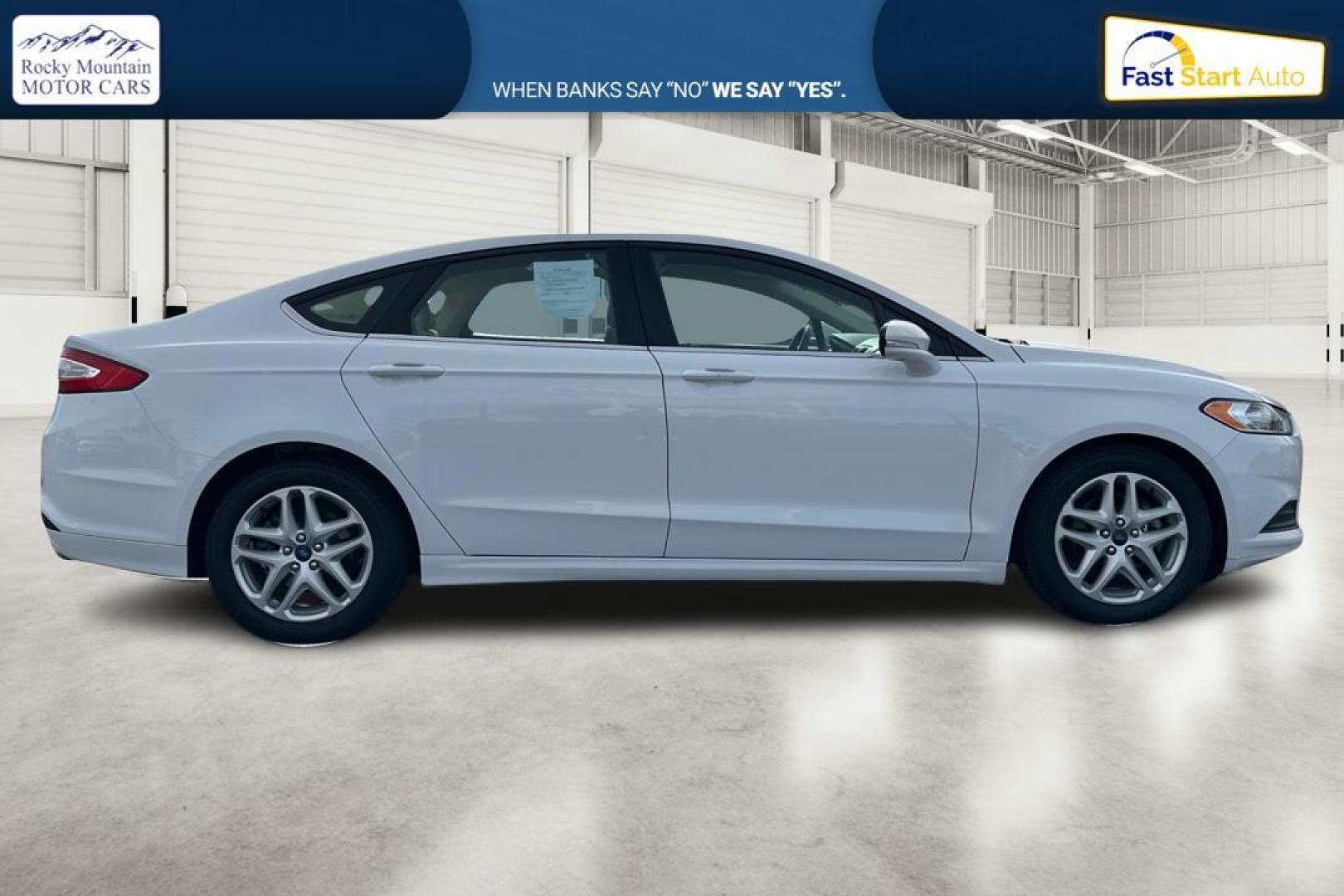 2016 White Ford Fusion SE (3FA6P0H77GR) with an 2.5L L4 DOHC 16V engine, 6-Speed Automatic transmission, located at 7755 State Street, Midvale, UT, 84047, (801) 753-9063, 40.610329, -111.892159 - Photo#1