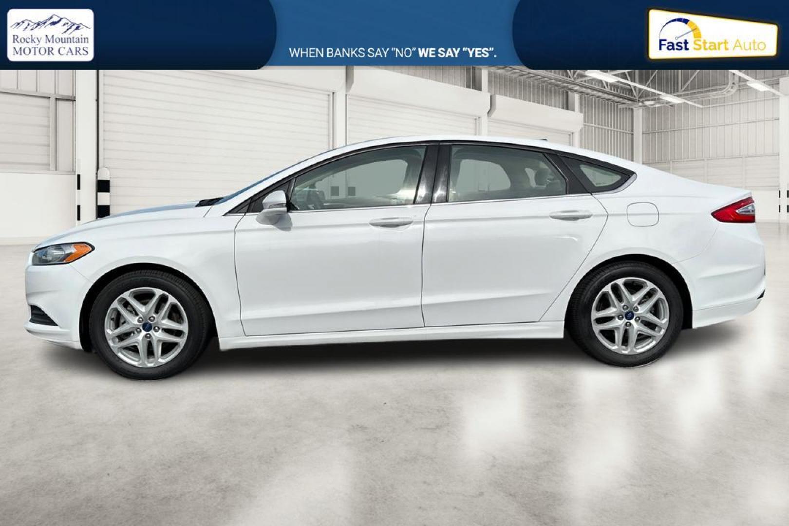 2016 White Ford Fusion SE (3FA6P0H77GR) with an 2.5L L4 DOHC 16V engine, 6-Speed Automatic transmission, located at 7755 State Street, Midvale, UT, 84047, (801) 753-9063, 40.610329, -111.892159 - Photo#6