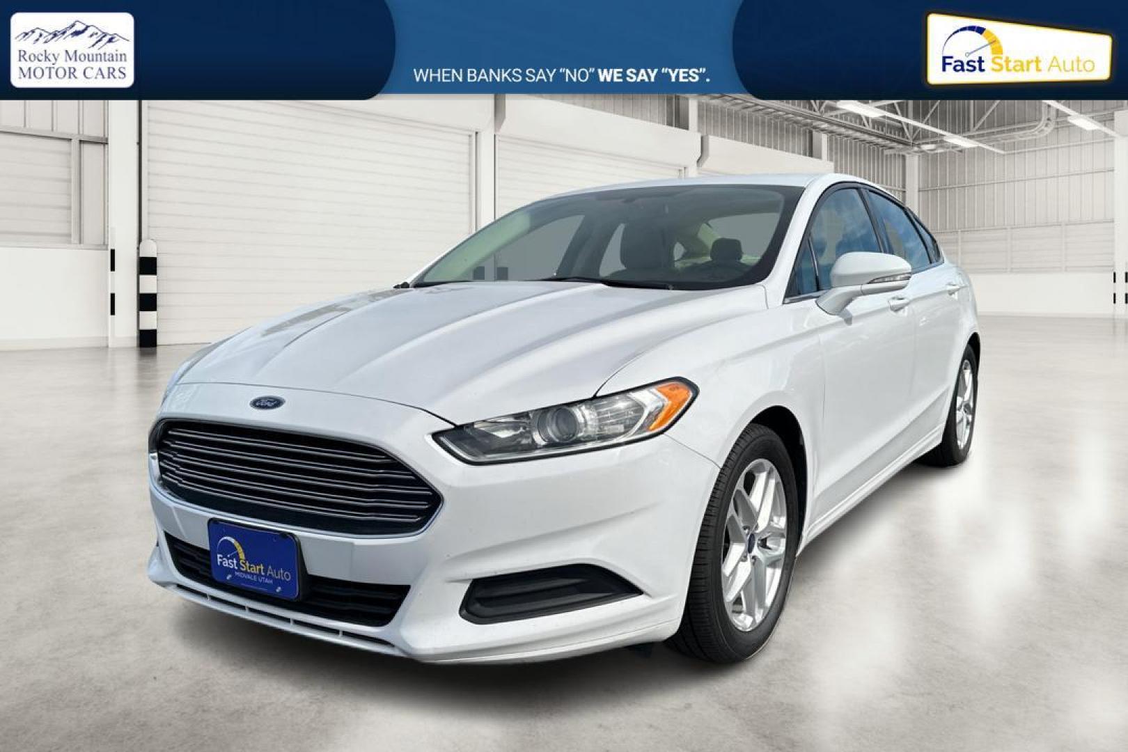 2016 White Ford Fusion SE (3FA6P0H77GR) with an 2.5L L4 DOHC 16V engine, 6-Speed Automatic transmission, located at 7755 State Street, Midvale, UT, 84047, (801) 753-9063, 40.610329, -111.892159 - Photo#8