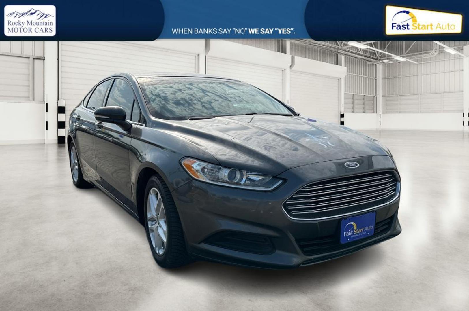 2016 Gray Ford Fusion SE (3FA6P0H7XGR) with an 2.5L L4 DOHC 16V engine, 6-Speed Automatic transmission, located at 7755 State Street, Midvale, UT, 84047, (801) 753-9063, 40.610329, -111.892159 - Photo#0