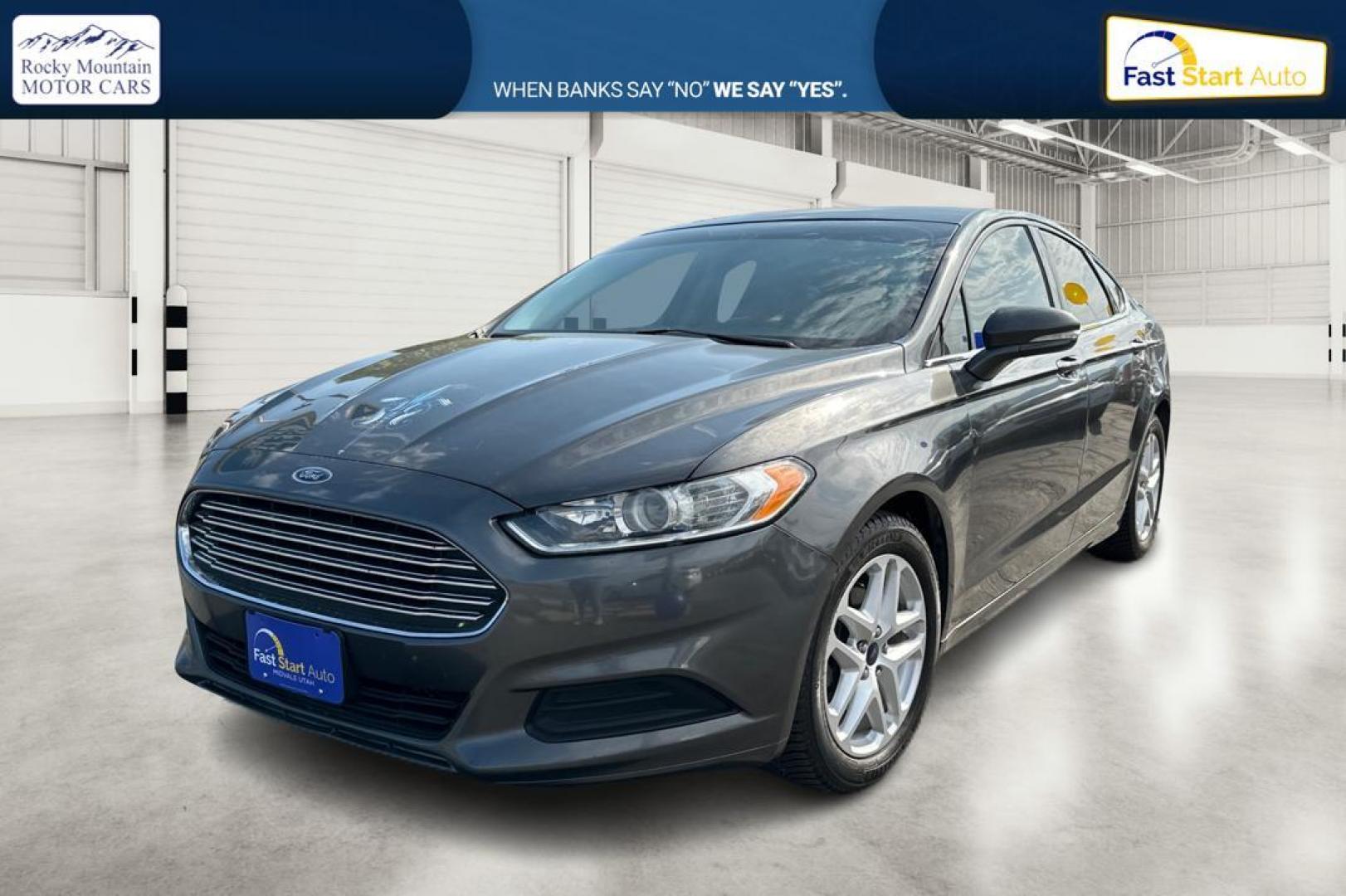 2016 Gray Ford Fusion SE (3FA6P0H7XGR) with an 2.5L L4 DOHC 16V engine, 6-Speed Automatic transmission, located at 7755 State Street, Midvale, UT, 84047, (801) 753-9063, 40.610329, -111.892159 - Photo#6