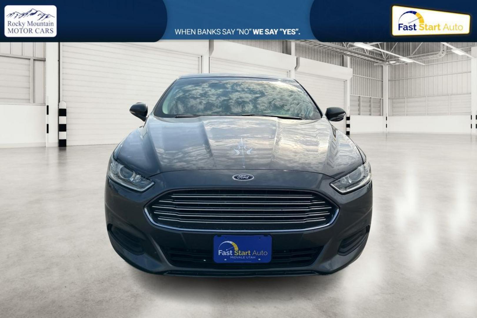 2016 Gray Ford Fusion SE (3FA6P0H7XGR) with an 2.5L L4 DOHC 16V engine, 6-Speed Automatic transmission, located at 7755 State Street, Midvale, UT, 84047, (801) 753-9063, 40.610329, -111.892159 - Photo#7