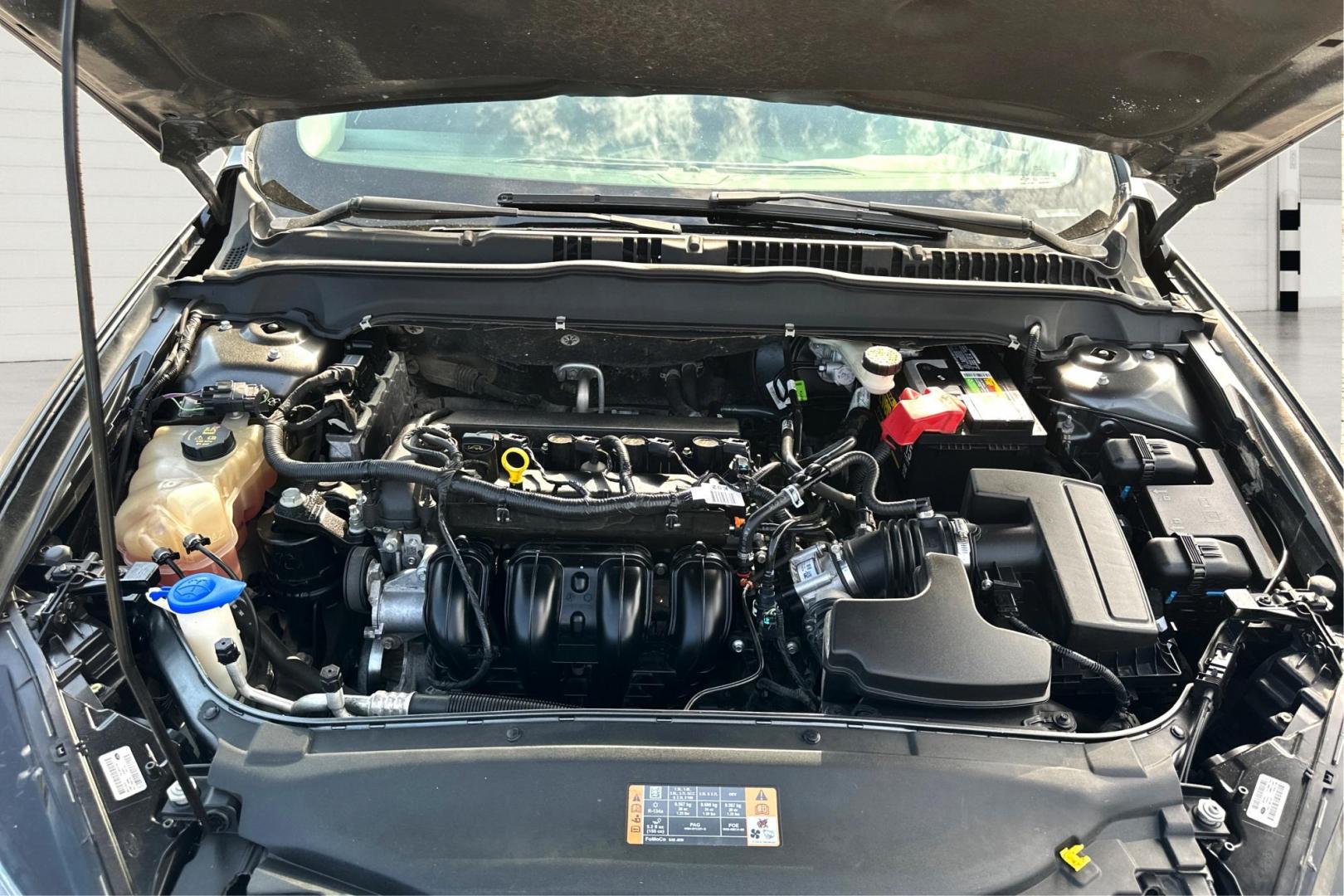 2016 Gray Ford Fusion SE (3FA6P0H7XGR) with an 2.5L L4 DOHC 16V engine, 6-Speed Automatic transmission, located at 7755 State Street, Midvale, UT, 84047, (801) 753-9063, 40.610329, -111.892159 - Photo#8