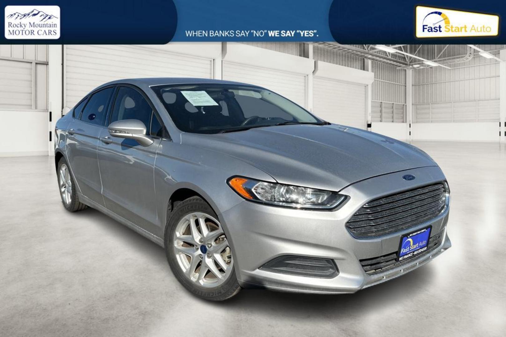 2016 Silver Ford Fusion SE (3FA6P0HD4GR) with an 1.5L L4 DOHC 16V engine, 6-Speed Automatic transmission, located at 344 S Washington Blvd, Ogden, UT, 84404, (801) 399-1799, 41.255482, -111.970848 - Photo#0