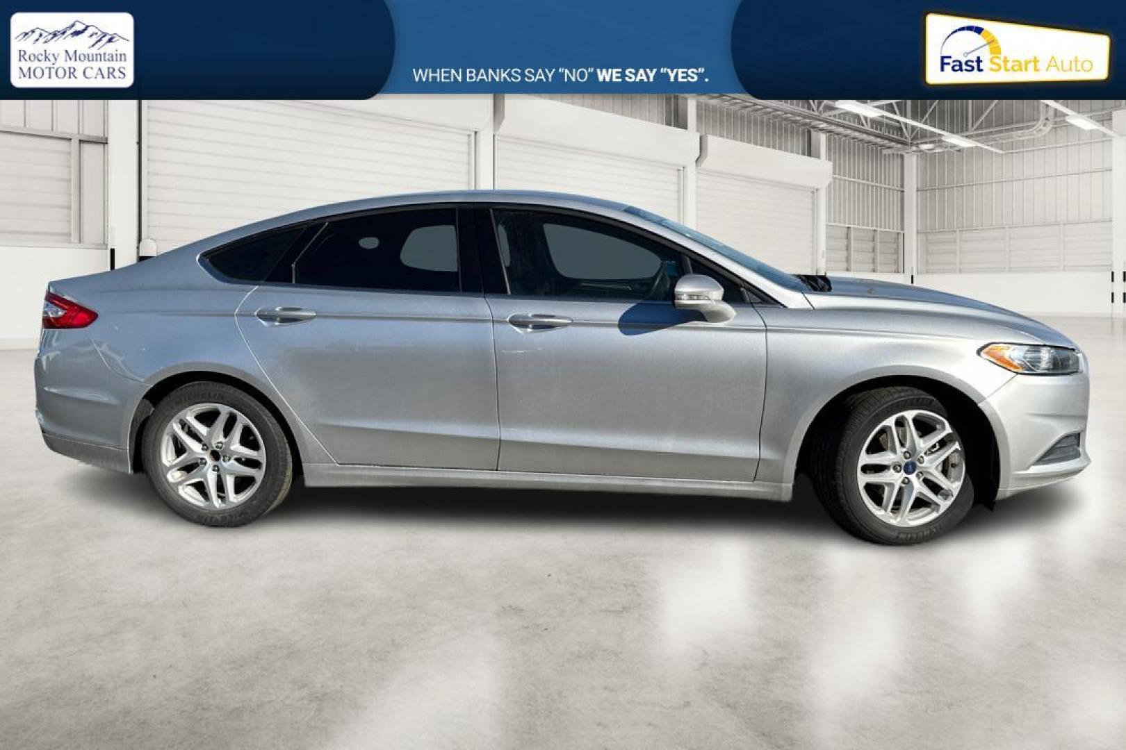 2016 Silver Ford Fusion SE (3FA6P0HD4GR) with an 1.5L L4 DOHC 16V engine, 6-Speed Automatic transmission, located at 344 S Washington Blvd, Ogden, UT, 84404, (801) 399-1799, 41.255482, -111.970848 - Photo#1