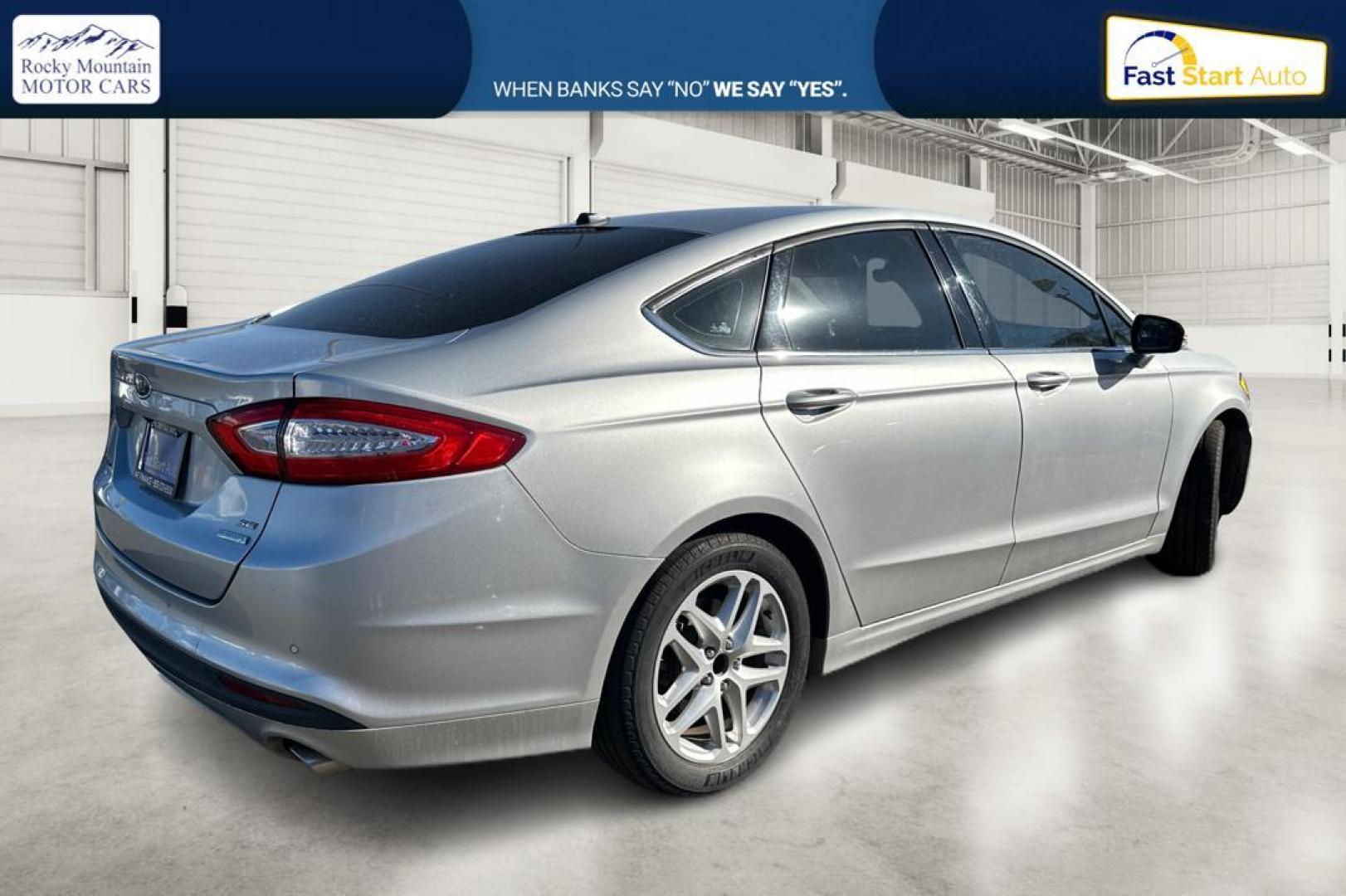 2016 Silver Ford Fusion SE (3FA6P0HD4GR) with an 1.5L L4 DOHC 16V engine, 6-Speed Automatic transmission, located at 344 S Washington Blvd, Ogden, UT, 84404, (801) 399-1799, 41.255482, -111.970848 - Photo#2