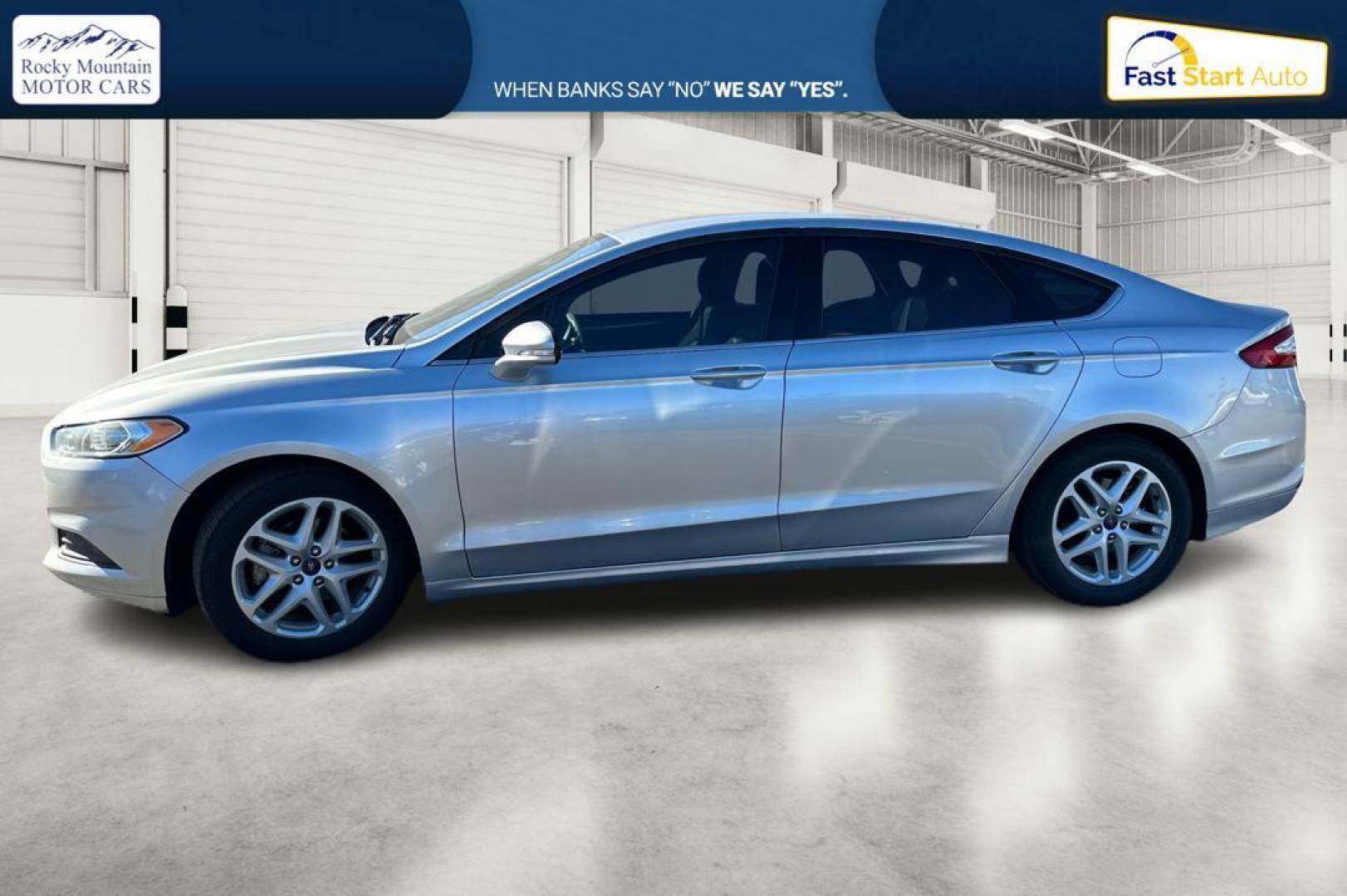 2016 Silver Ford Fusion SE (3FA6P0HD4GR) with an 1.5L L4 DOHC 16V engine, 6-Speed Automatic transmission, located at 344 S Washington Blvd, Ogden, UT, 84404, (801) 399-1799, 41.255482, -111.970848 - Photo#5