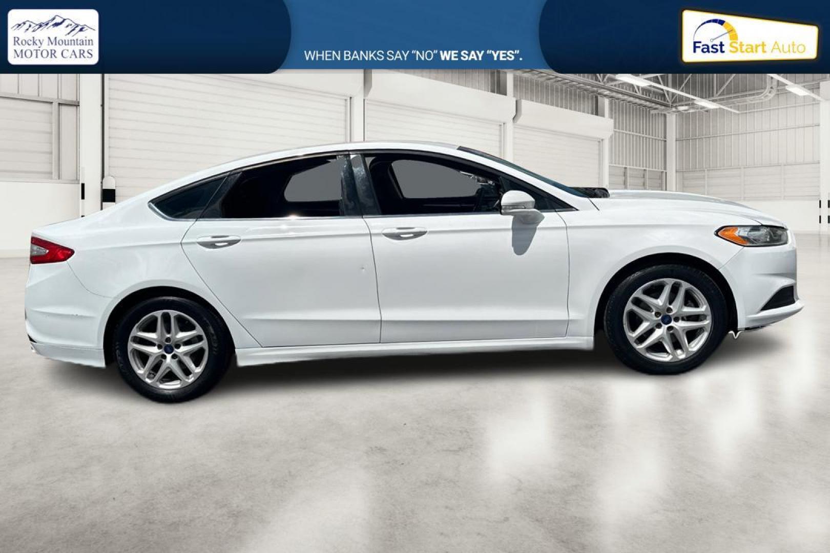 2016 White Ford Fusion SE (3FA6P0HD1GR) with an 1.5L L4 DOHC 16V engine, 6-Speed Automatic transmission, located at 767 S State Road, Pleasant Grove, UT, 84062, (801) 785-1058, 40.354839, -111.736687 - Photo#1