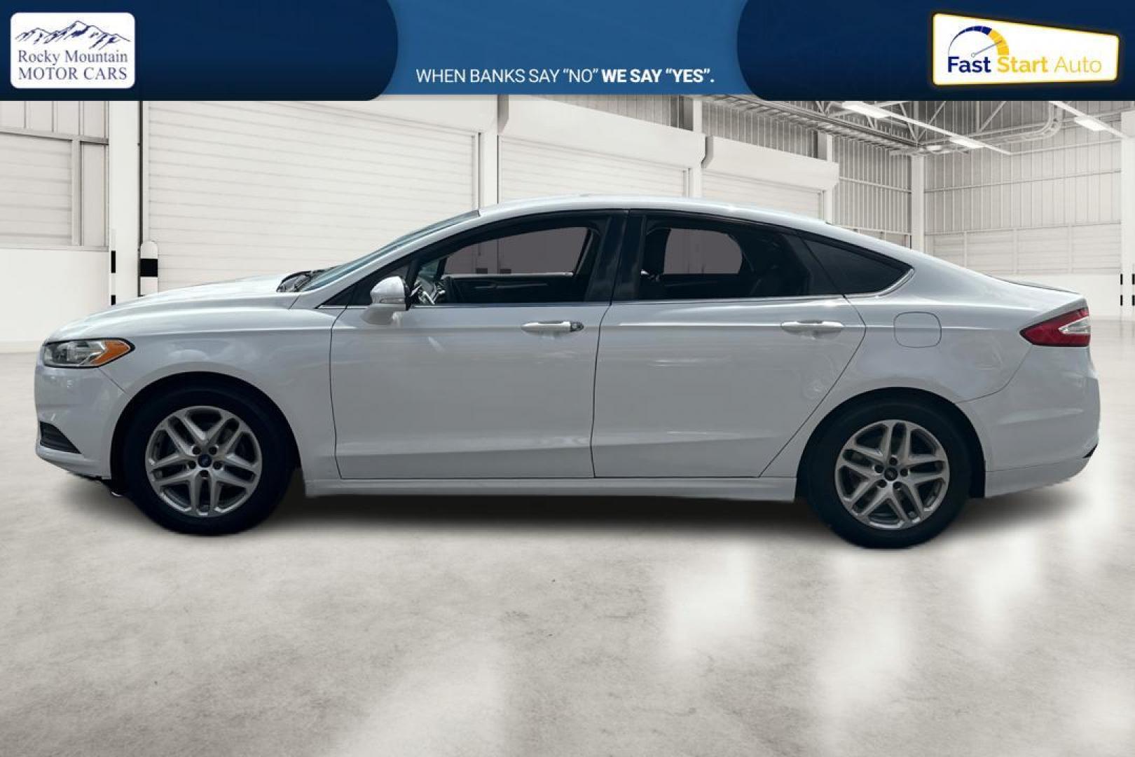 2016 White Ford Fusion SE (3FA6P0HD1GR) with an 1.5L L4 DOHC 16V engine, 6-Speed Automatic transmission, located at 767 S State Road, Pleasant Grove, UT, 84062, (801) 785-1058, 40.354839, -111.736687 - Photo#5