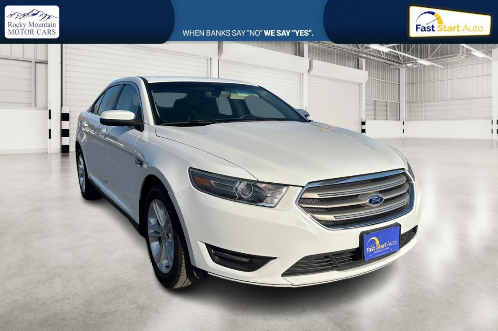 2016 White Ford Taurus SEL FWD (1FAHP2E83GG) with an 3.5L V6 DOHC 24V engine, 6A transmission, located at 344 S Washington Blvd, Ogden, UT, 84404, (801) 399-1799, 41.255482, -111.970848 - Photo#0